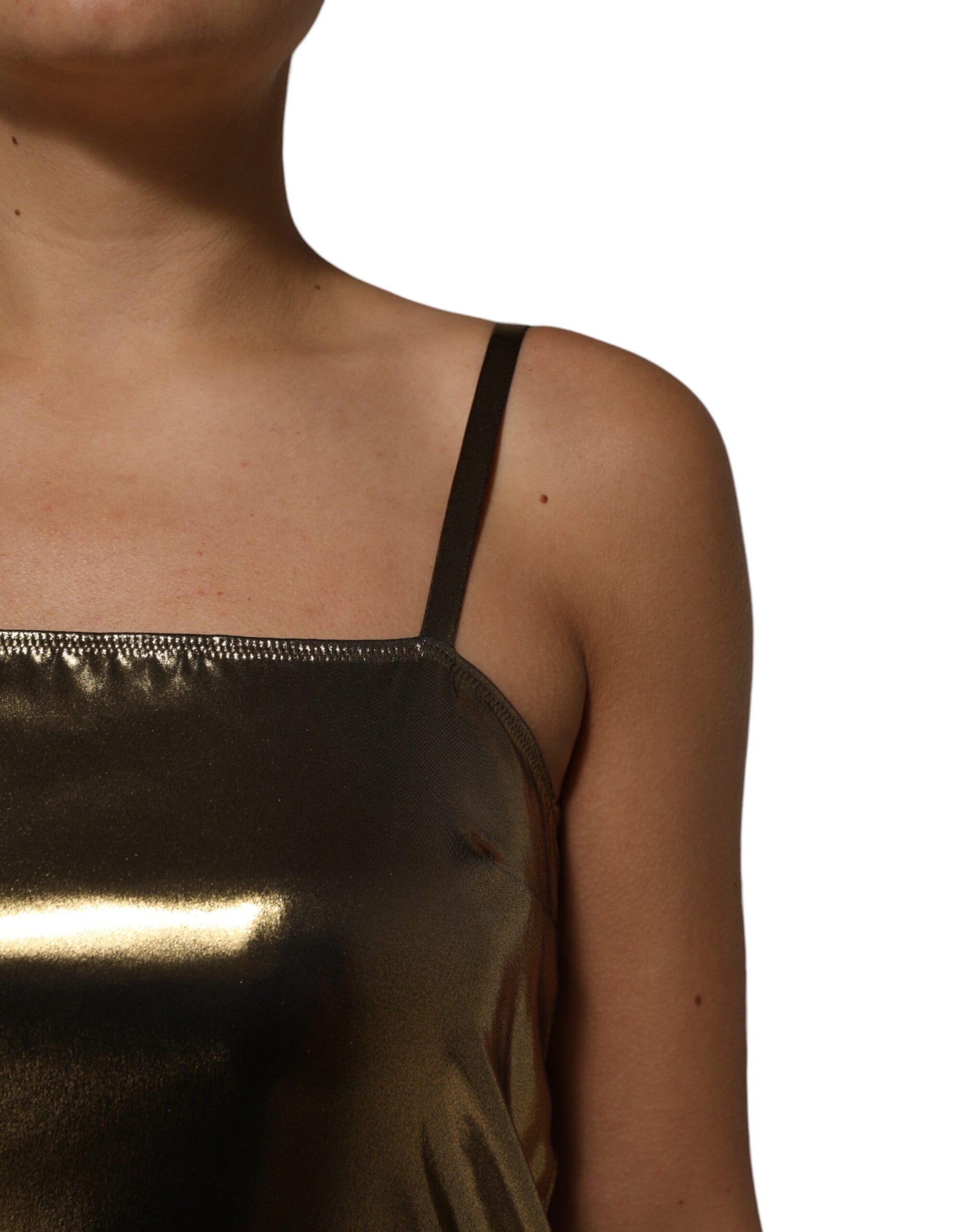 A sleeveless, metallic gold dress with an A-line silhouette