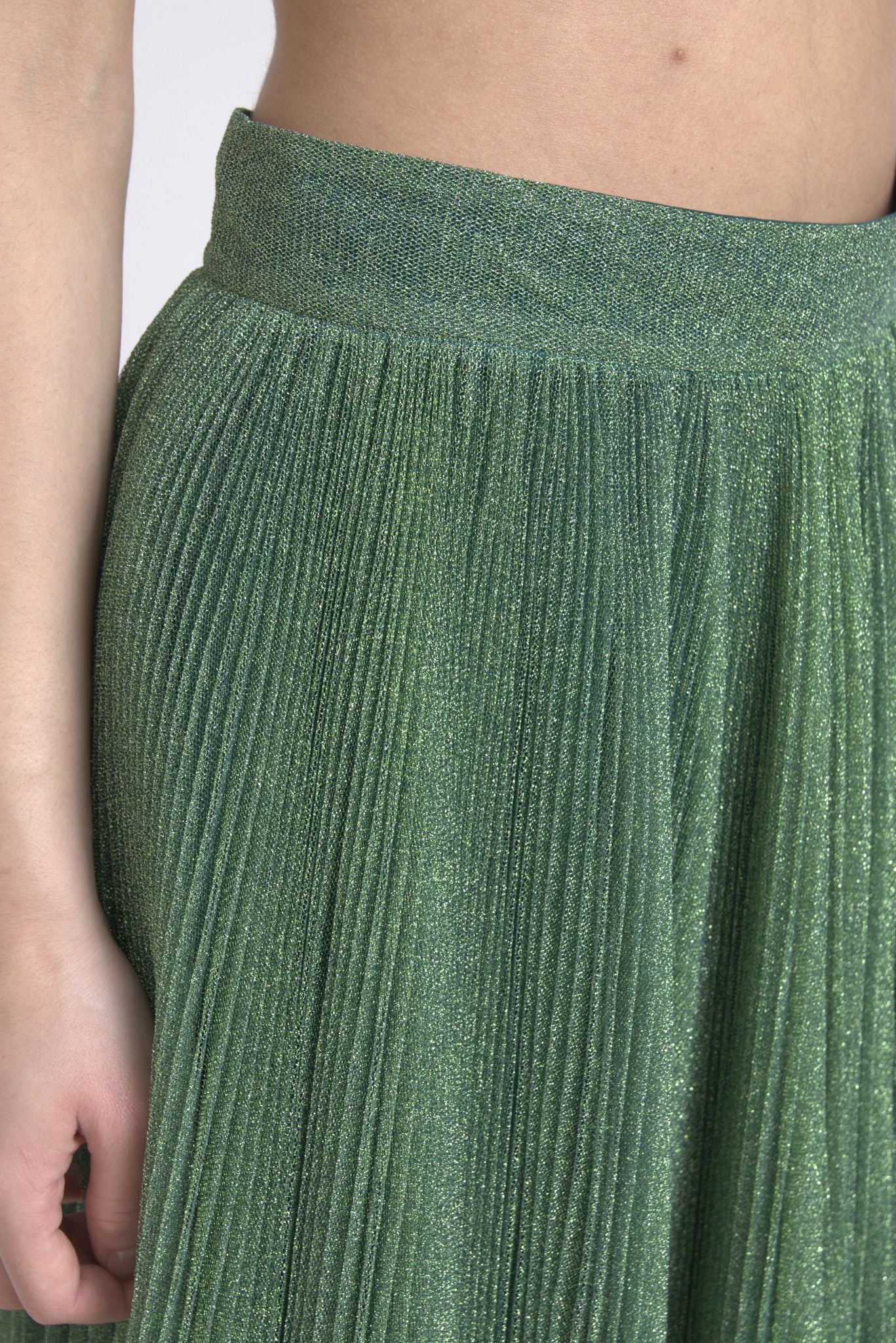 Green sequined skirt worn by a person
