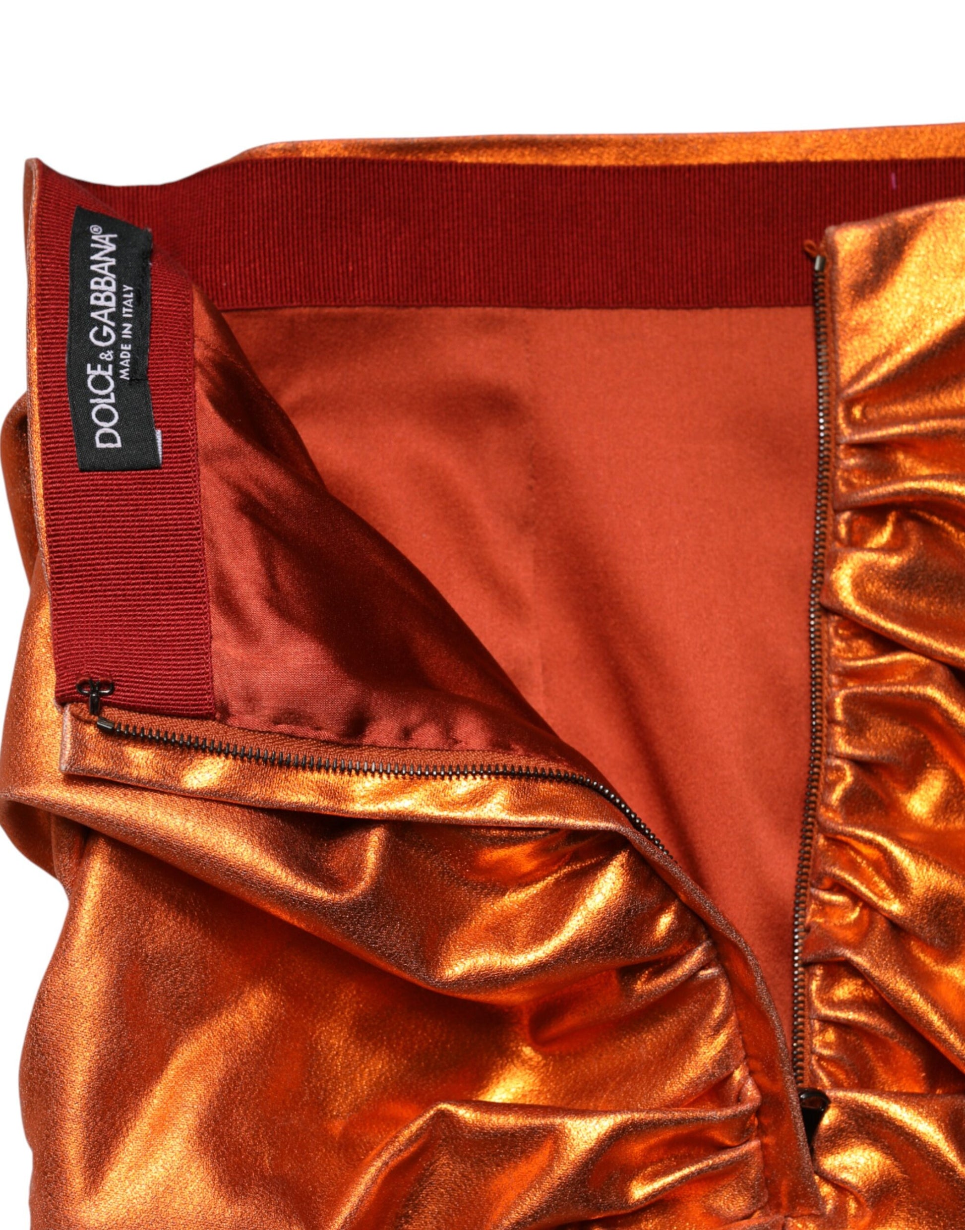 Red satin pants with ruffles on sides