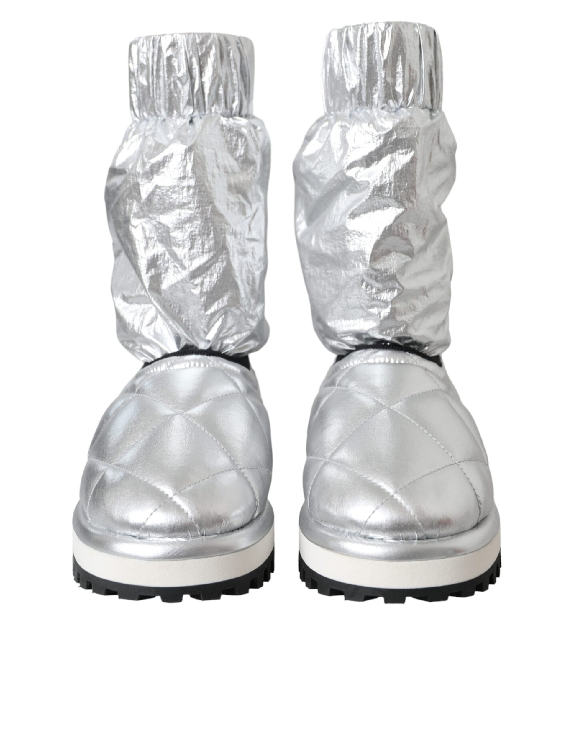 Silver boots with silver foil wrapping around them