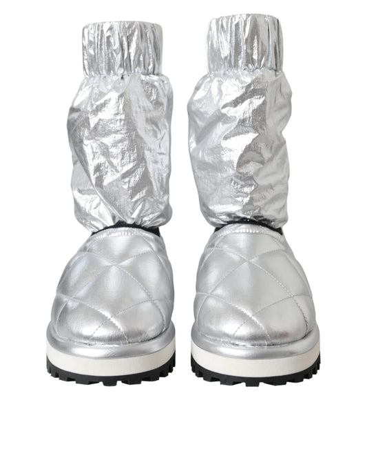 Silver boots with silver foil wrapping around them