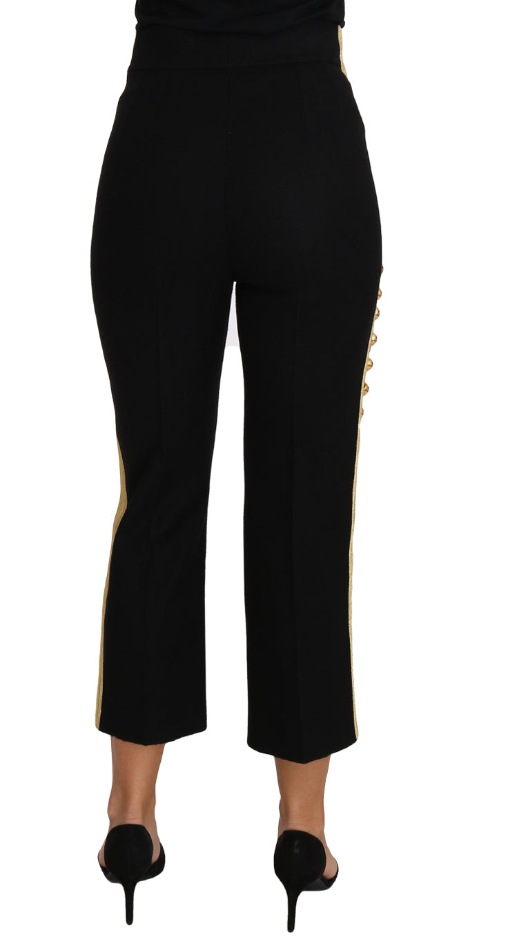 Pair of black pants with gold zipper detailing