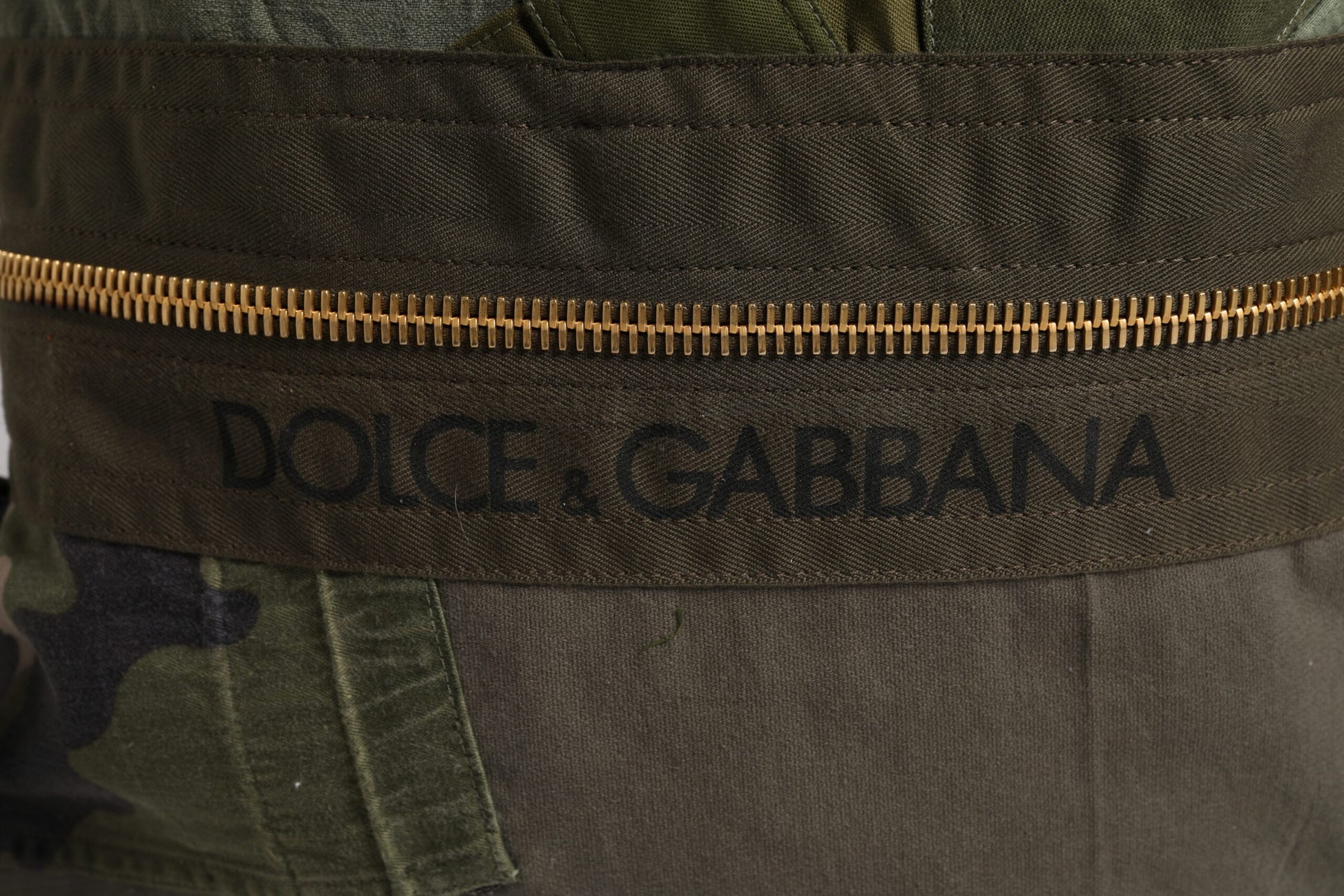 Camouflage pants with brand name on waistband
