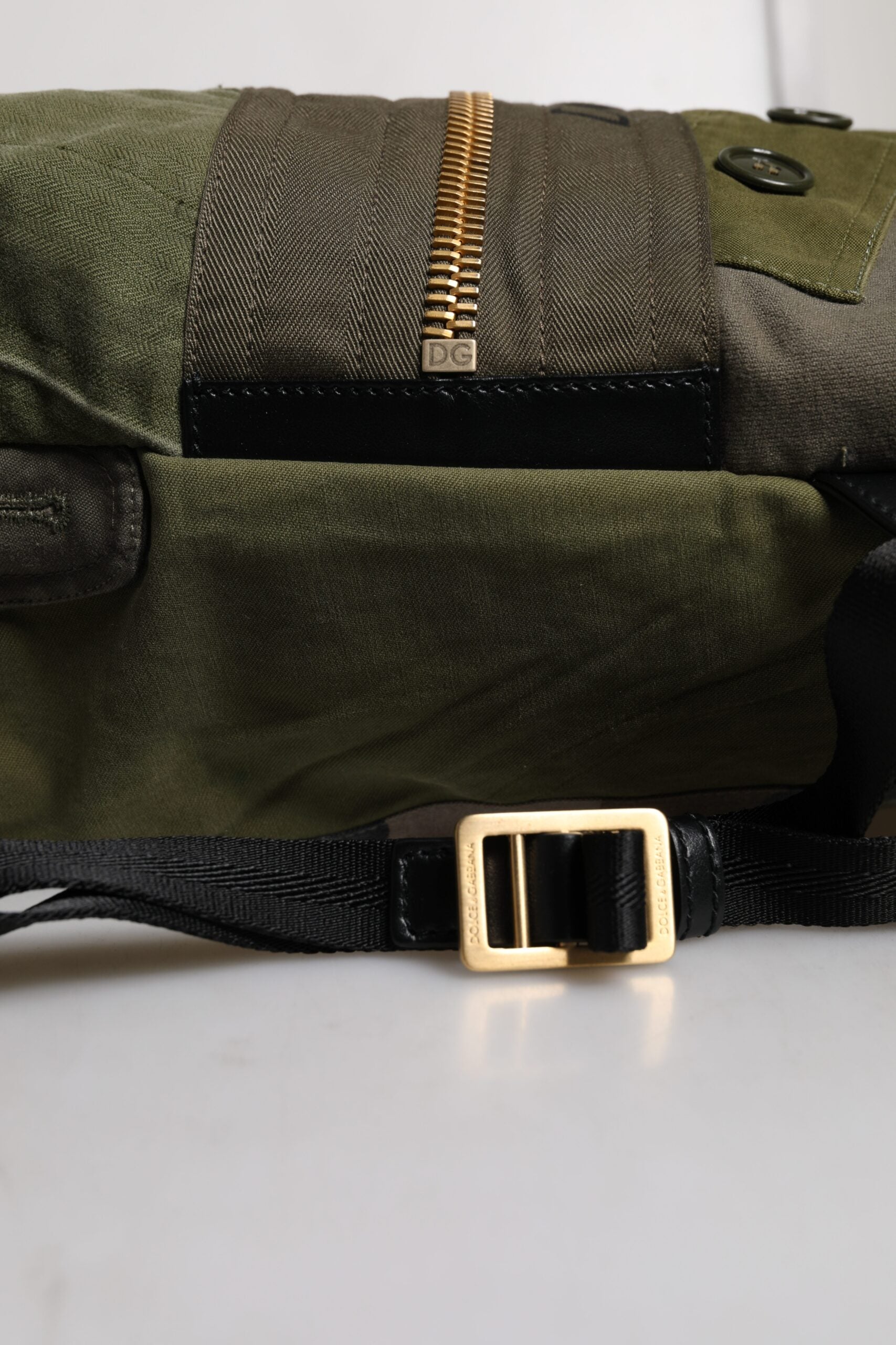 Green jacket with gold zipper pulls
