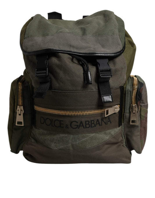 Backpack with zippered compartments and brand name on side