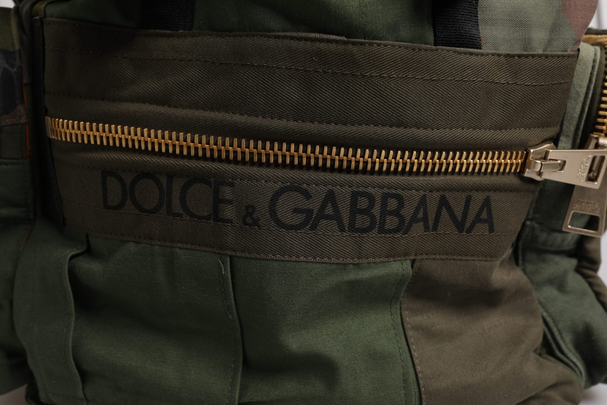 Green vest with zippered pocket on front