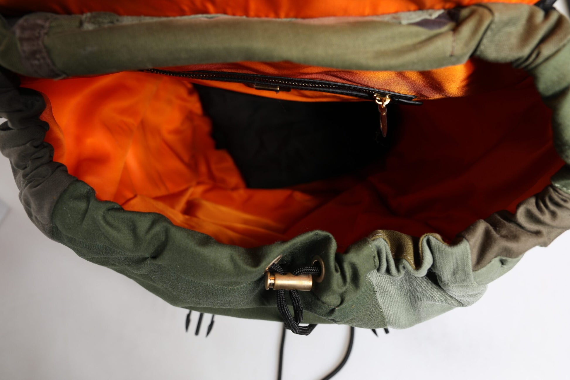 Green and orange backpack
