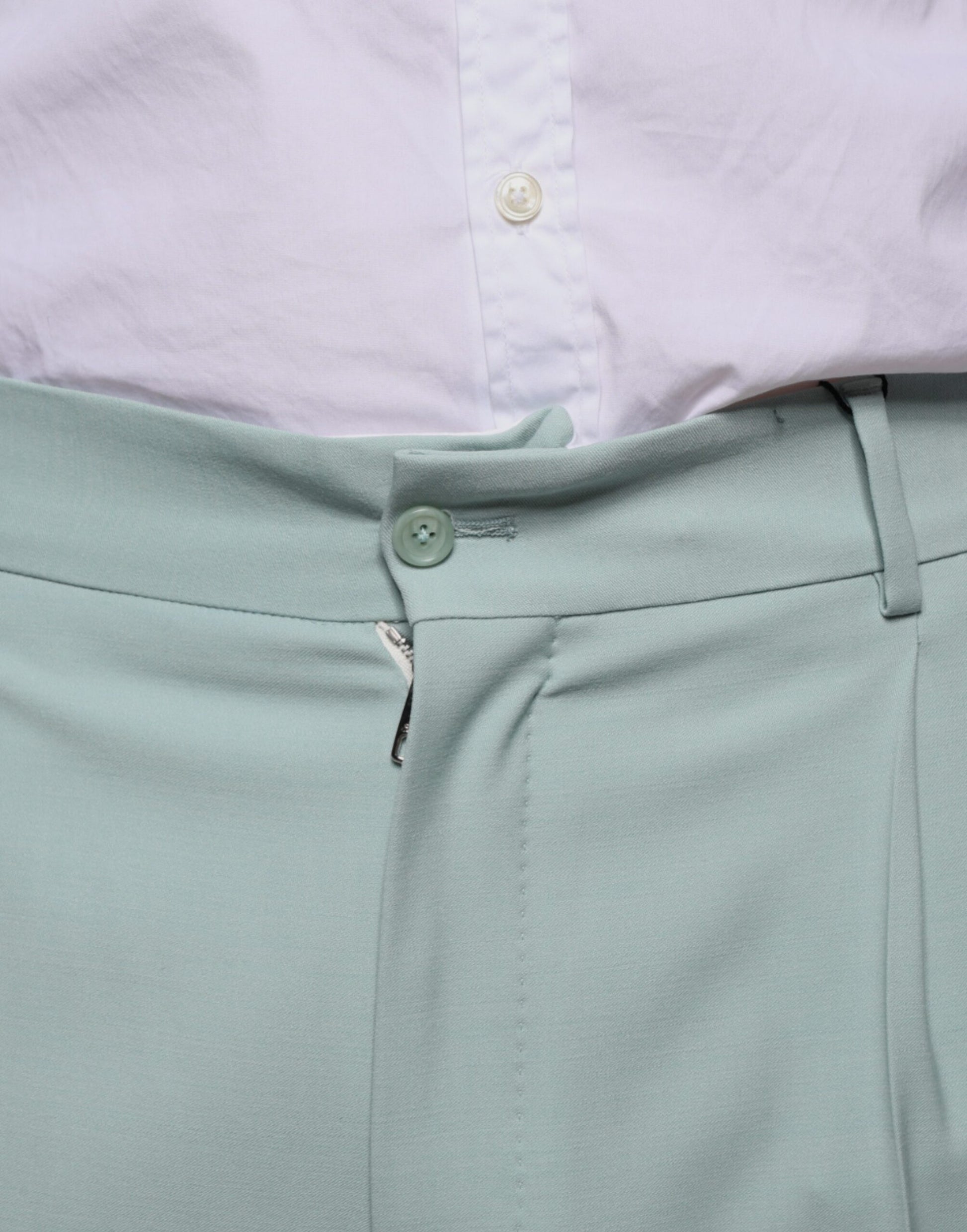 A pair of mint green cotton dress pants from Dolce & Gabbana
