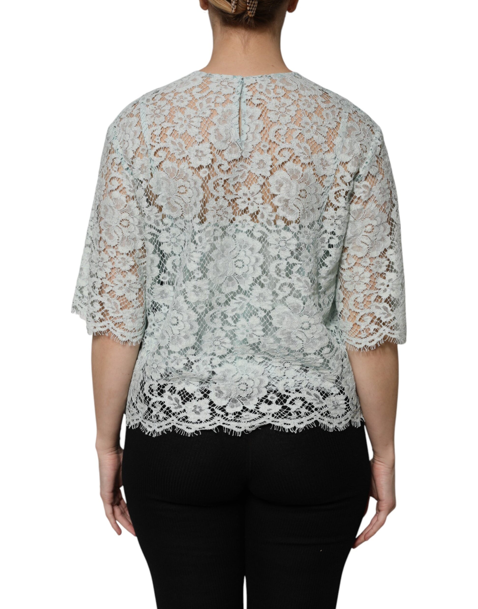 Woman wearing lace back blouse