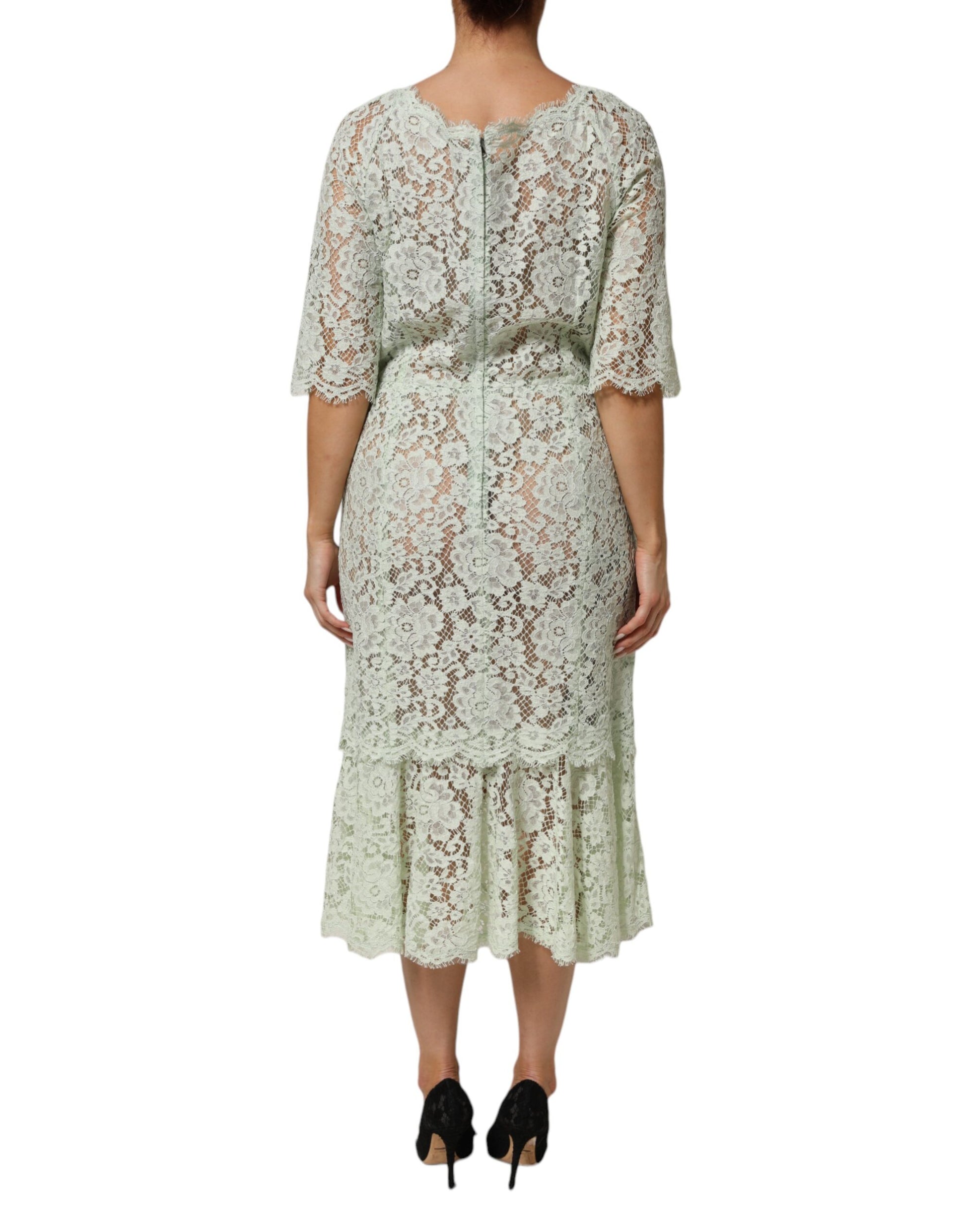 A woman's midi dress with lace trim and floral pattern