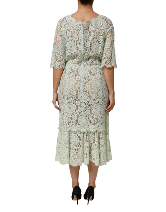 A woman's midi dress with lace trim and floral pattern