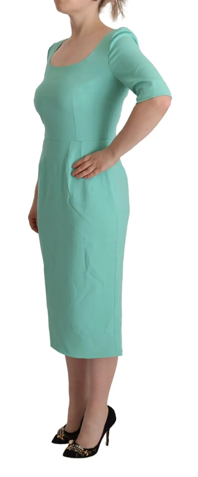 A mint green sheath dress with a square neckline and midi length, from the brand Dolce & Gabbana
