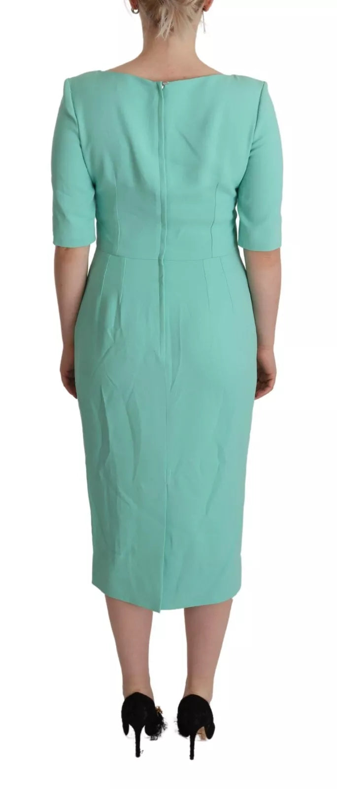 A mint green sheath dress with a square neckline and midi length, designed by Dolce & Gabbana