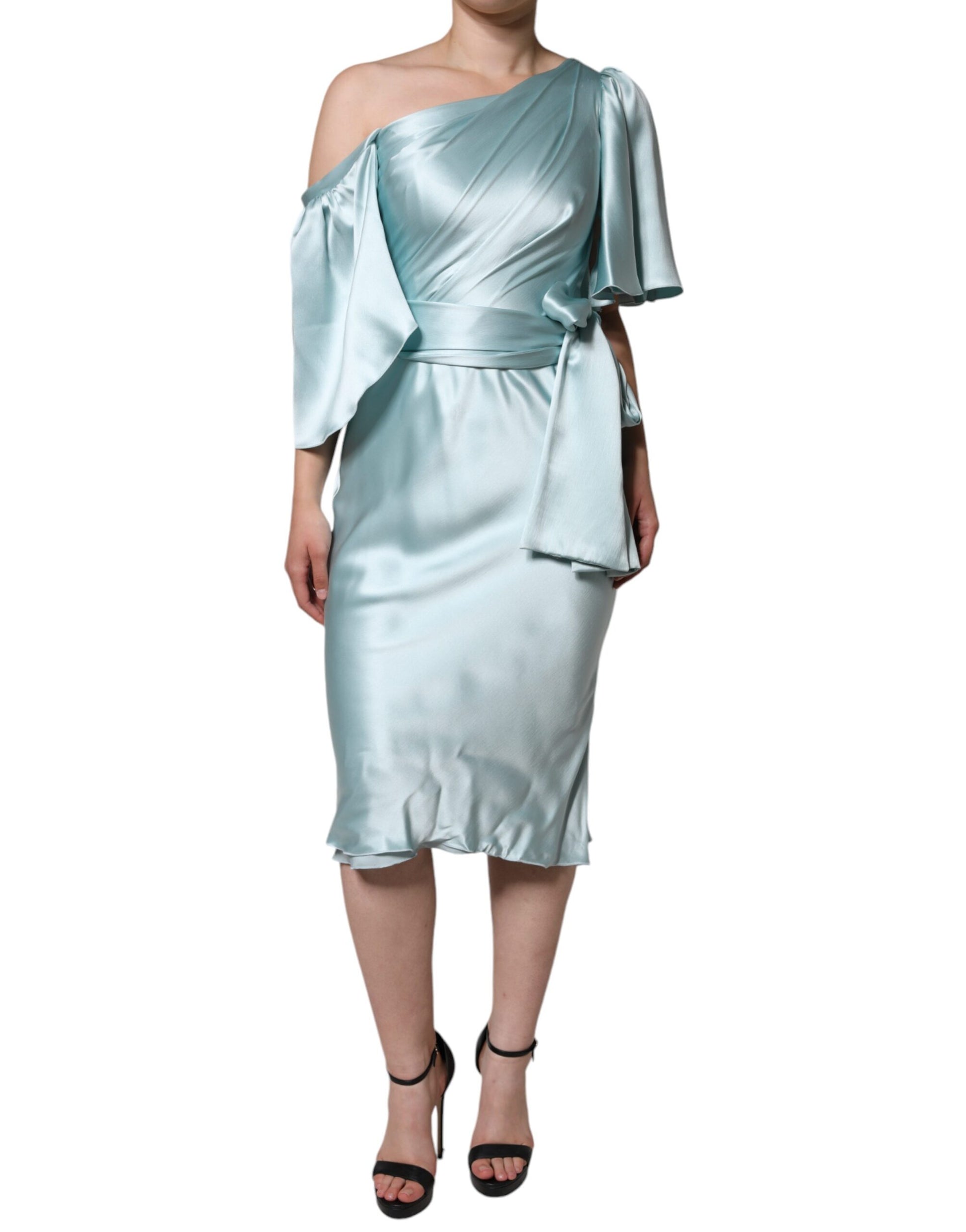 The dress is blue and has a ruffled design