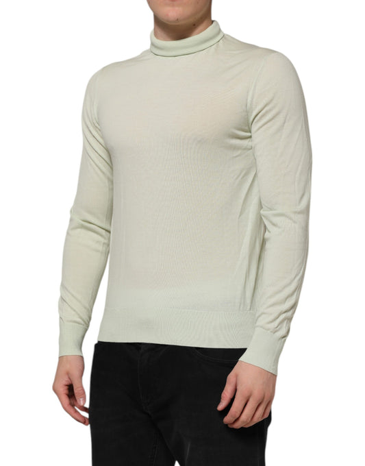 Man wearing a beige turtleneck sweater
