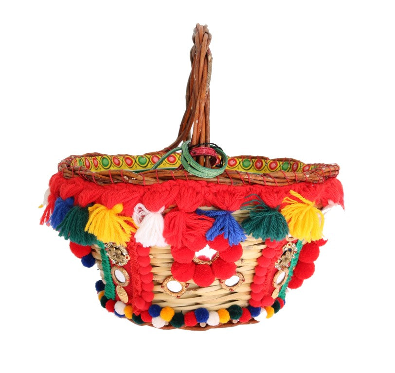 Colorful woven basket with fringe decorations hanging from handle