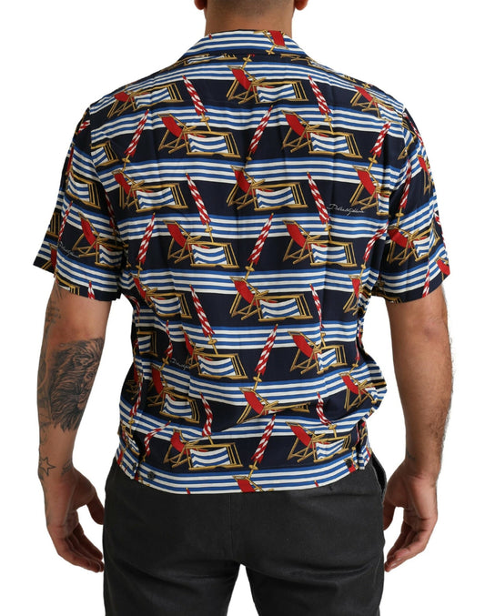 Man wearing a short sleeve shirt with a pattern of red and blue stripes