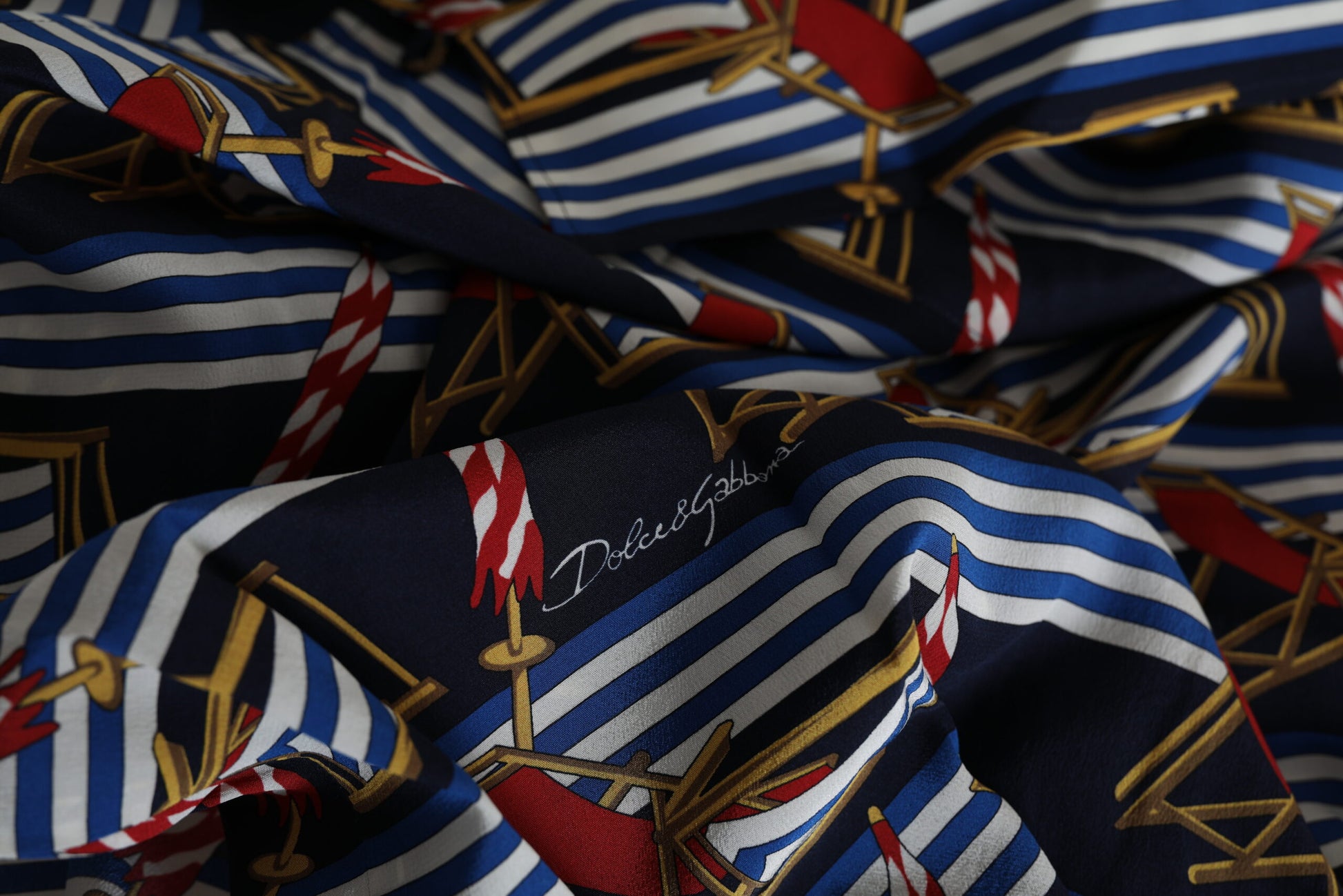 Blue and white striped fabric with nautical theme