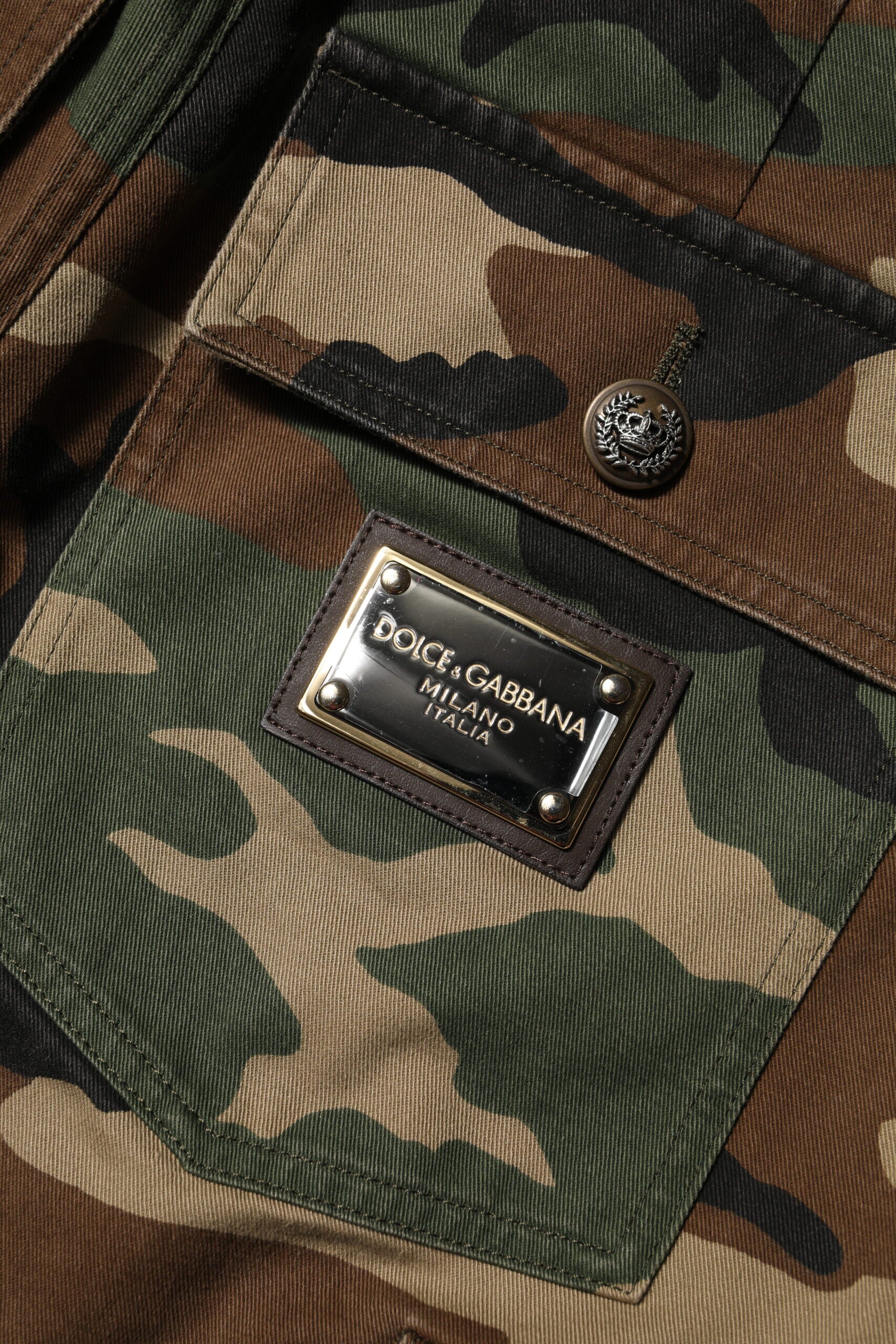 Camouflage military uniform with a label on the sleeve