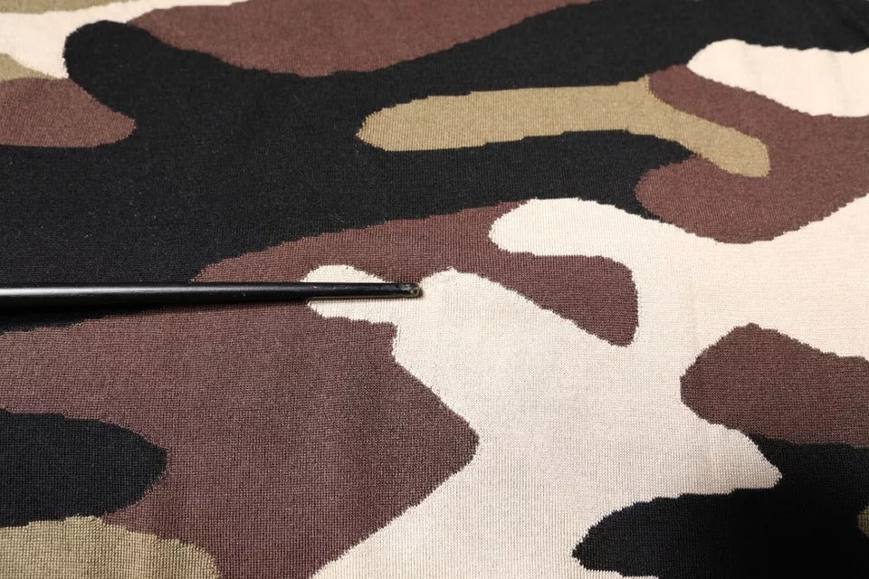 Black pen on camouflage fabric