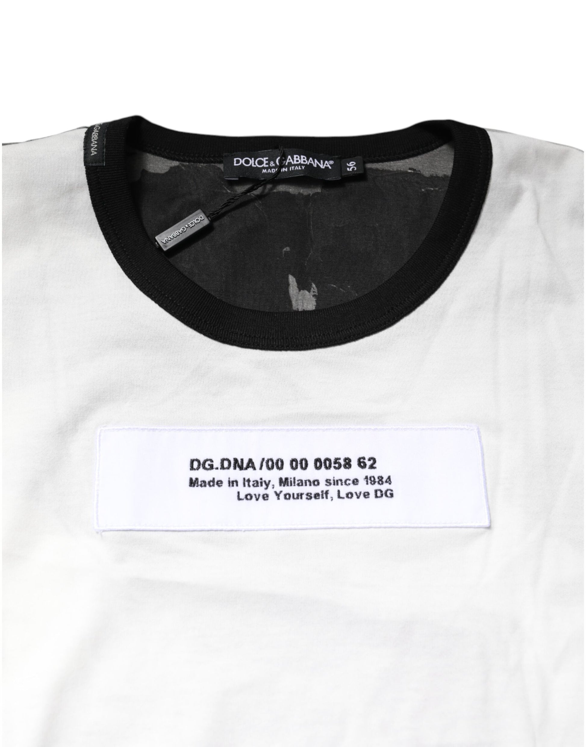 White t-shirt with black collar and tag on front