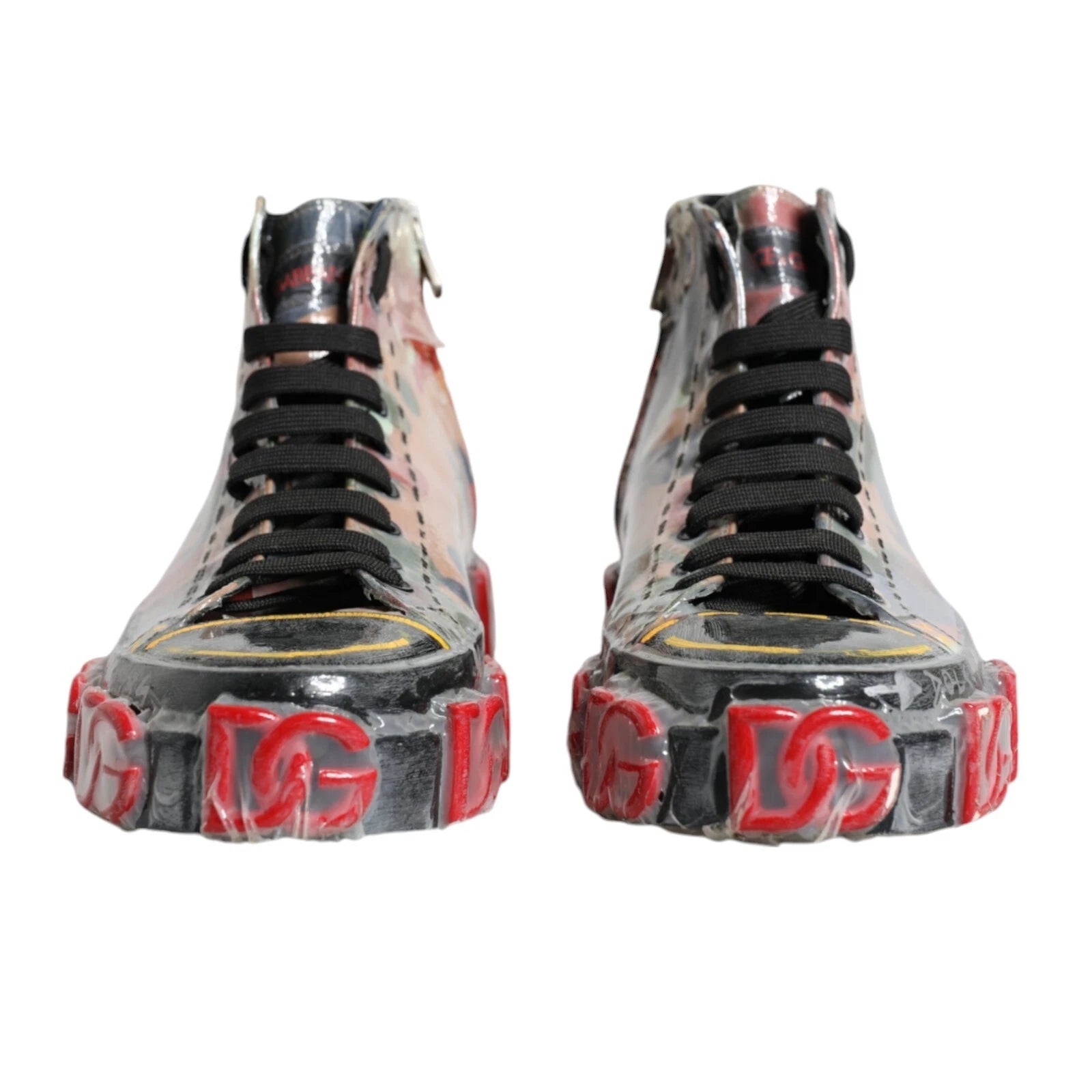 Pair of high top sneakers with red and black design