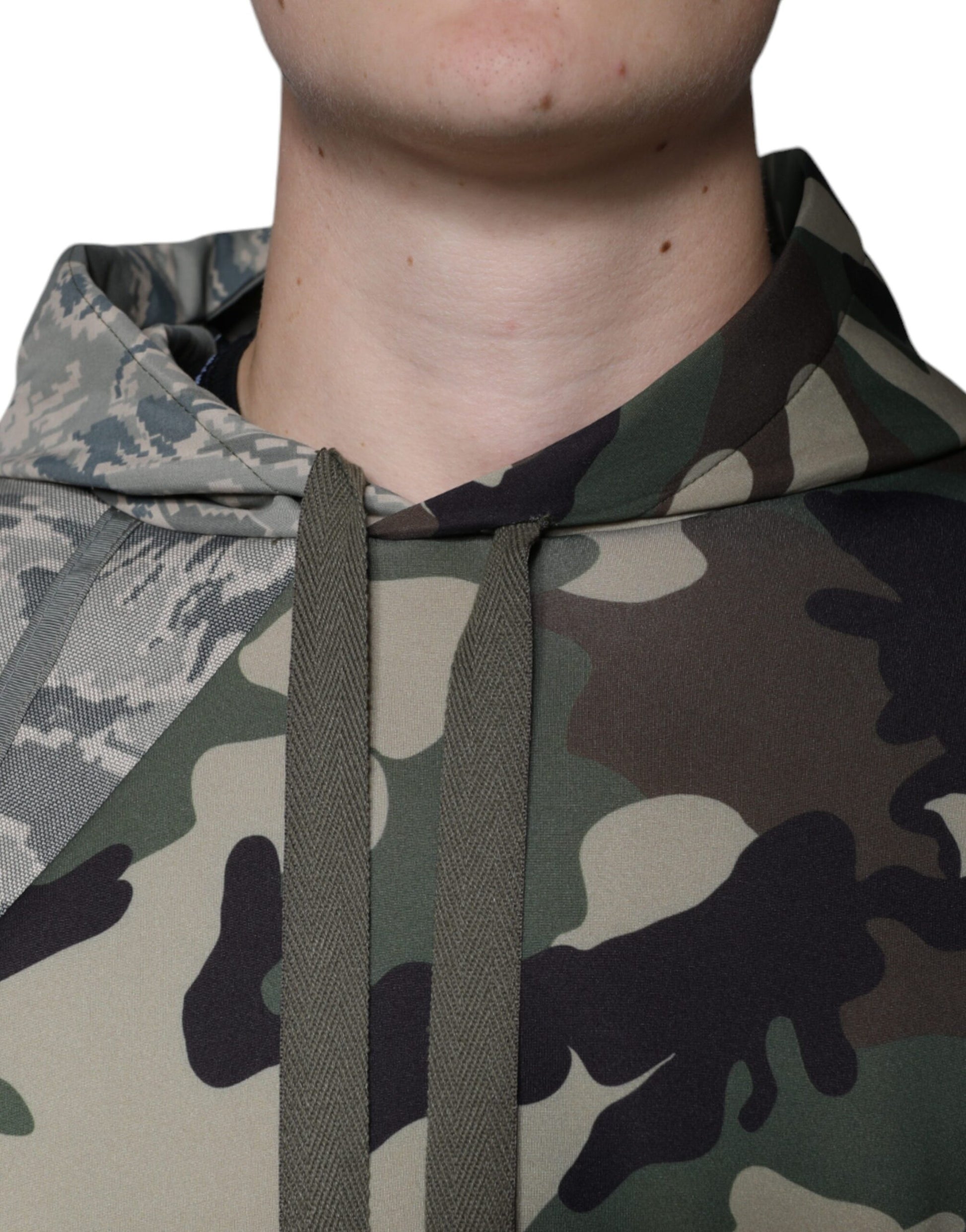 Camouflage hoodie on a man's neck