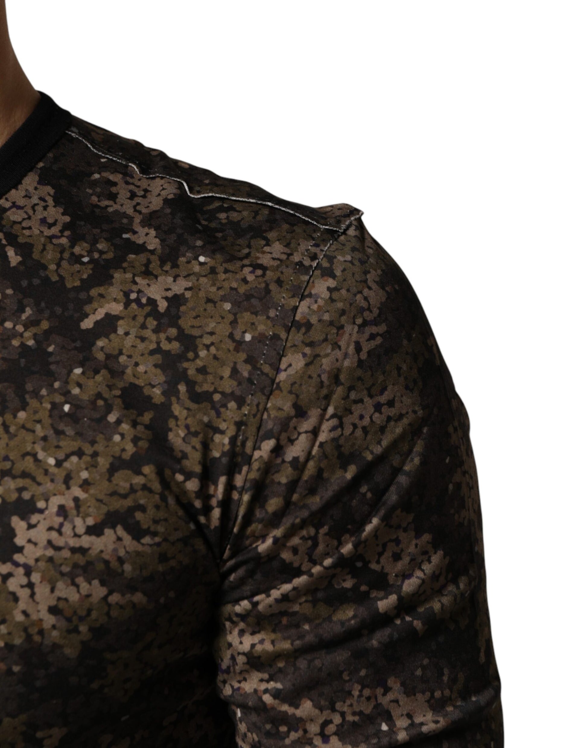 Camouflage patterned sleeve on a person's arm