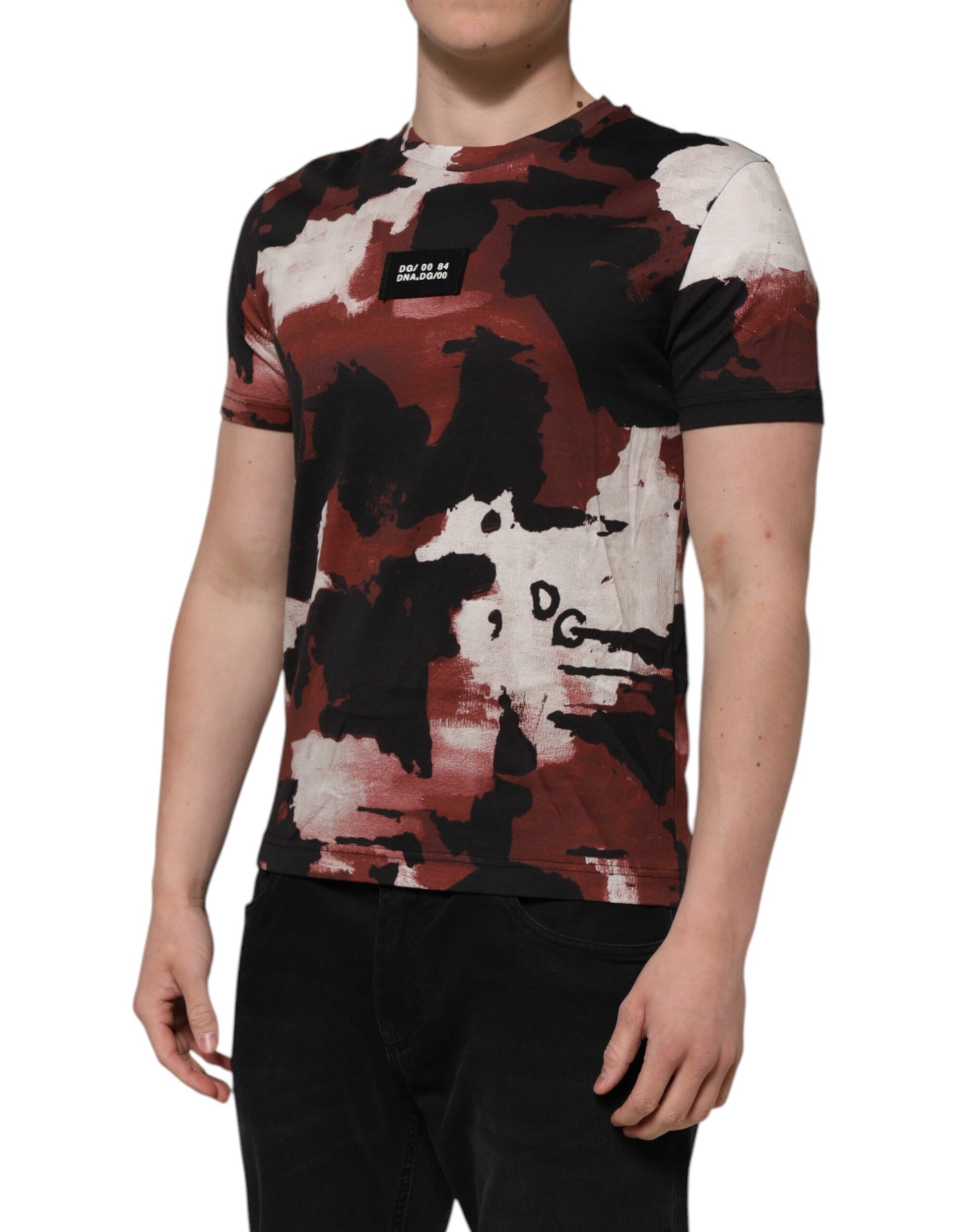 Man wearing a red and black tie dye t-shirt