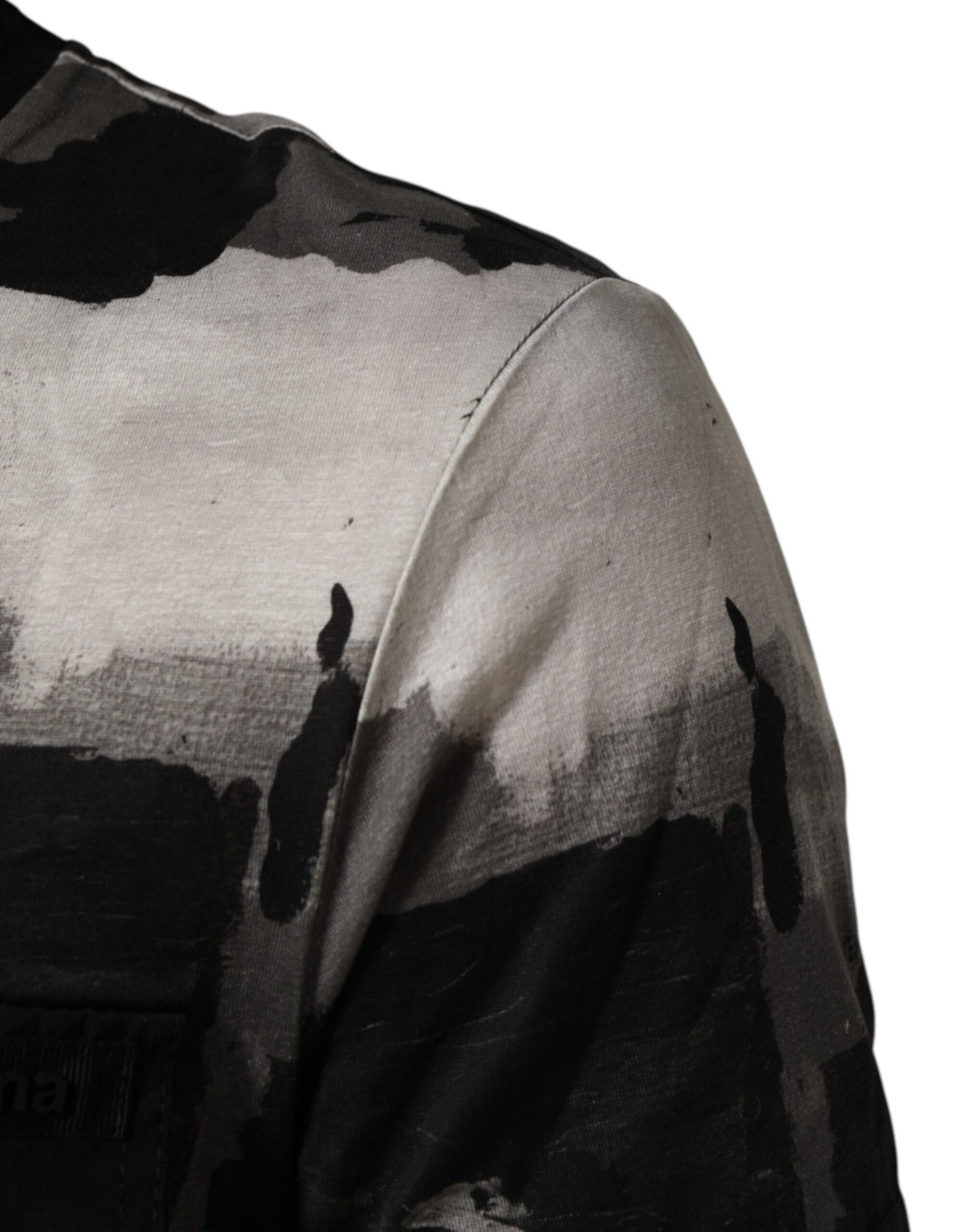 Camouflage patterned sleeve on a garment