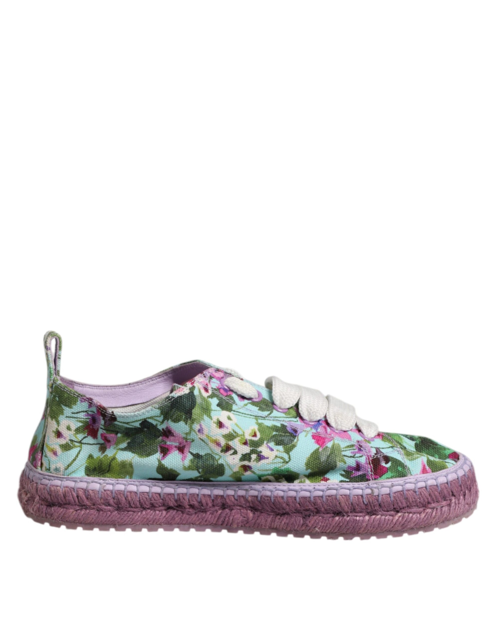 Pink floral patterned baby shoe with a padded sole
