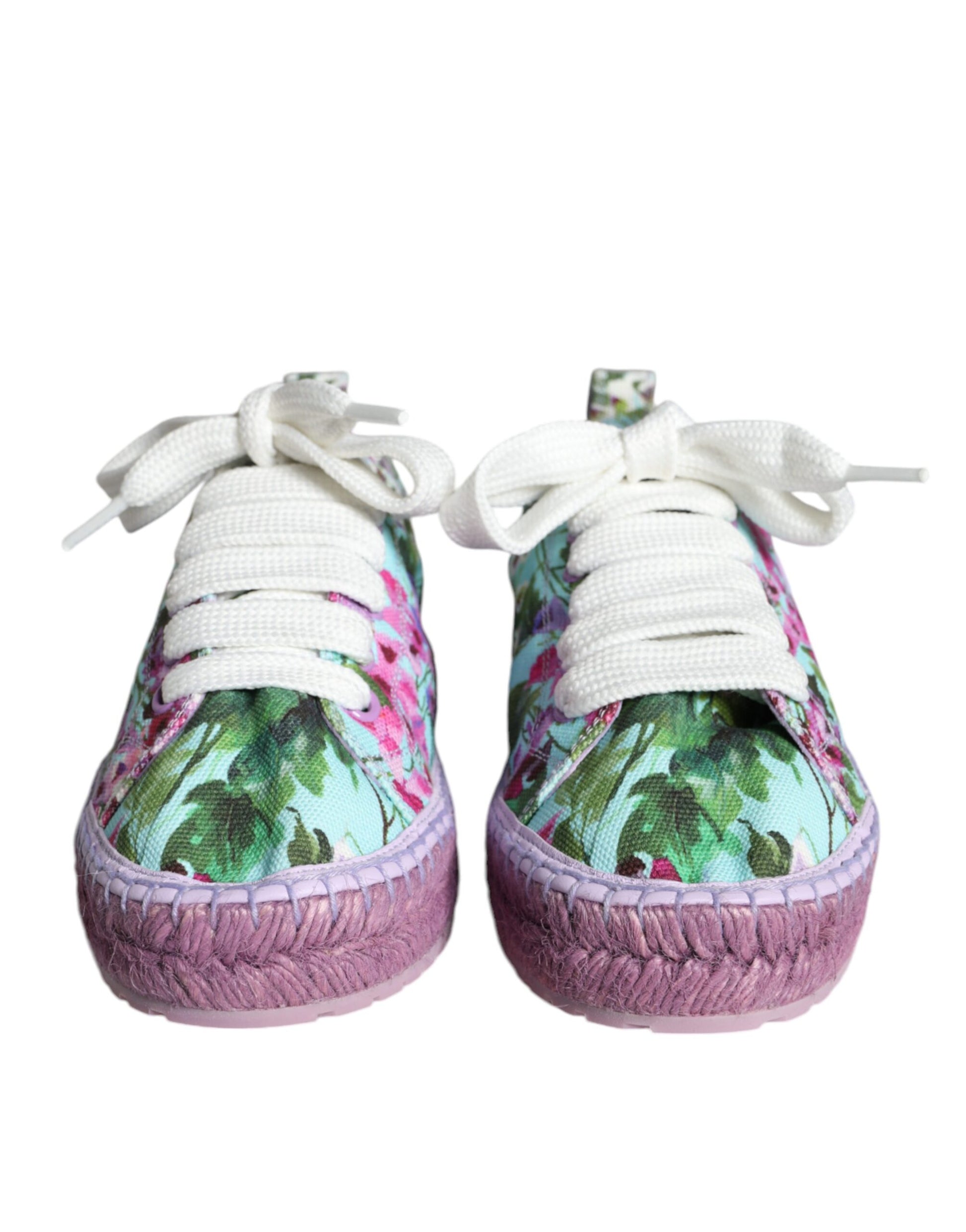 Pair of baby shoes with floral pattern and pink trim