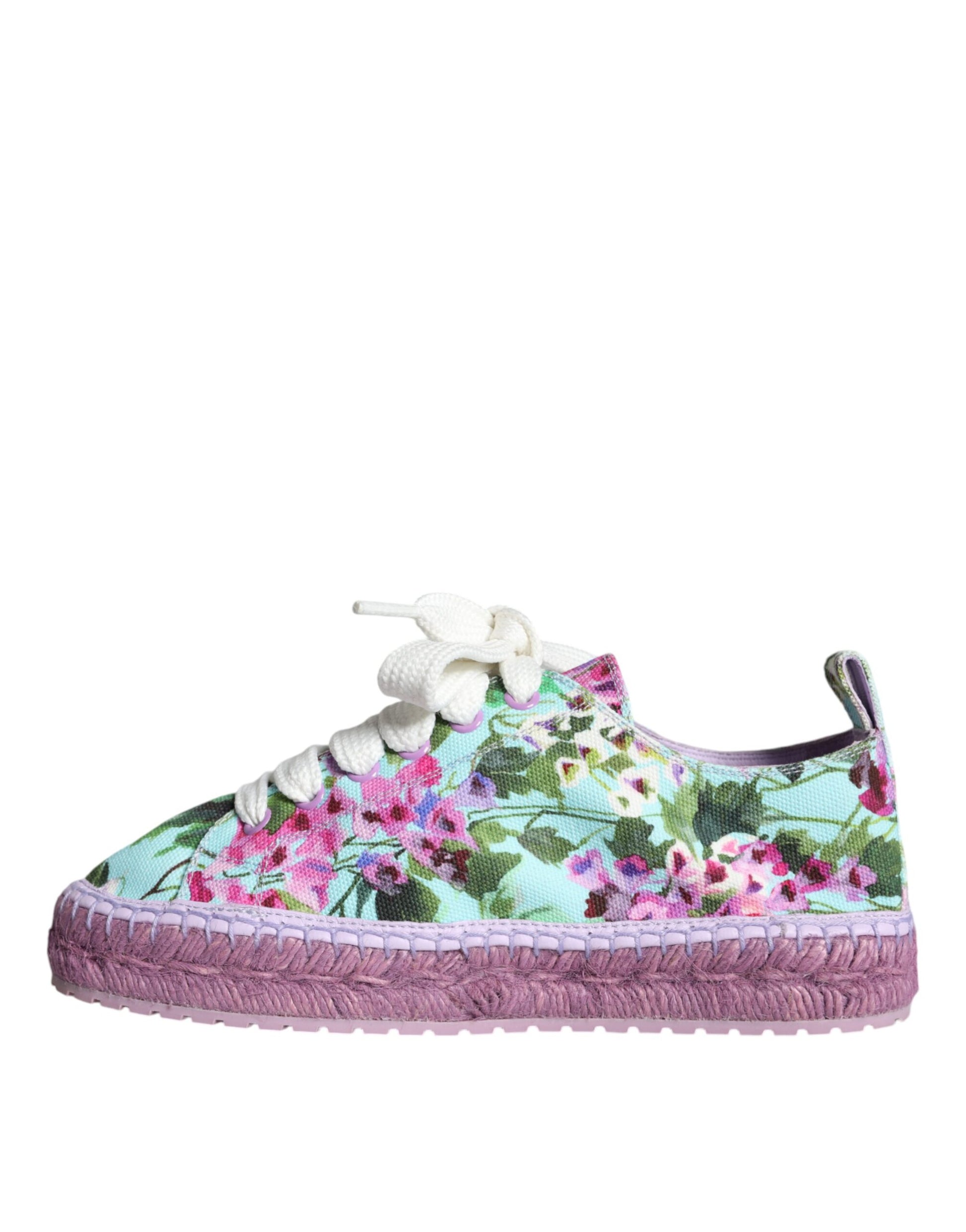 Pink and blue floral patterned baby shoes with pink soles