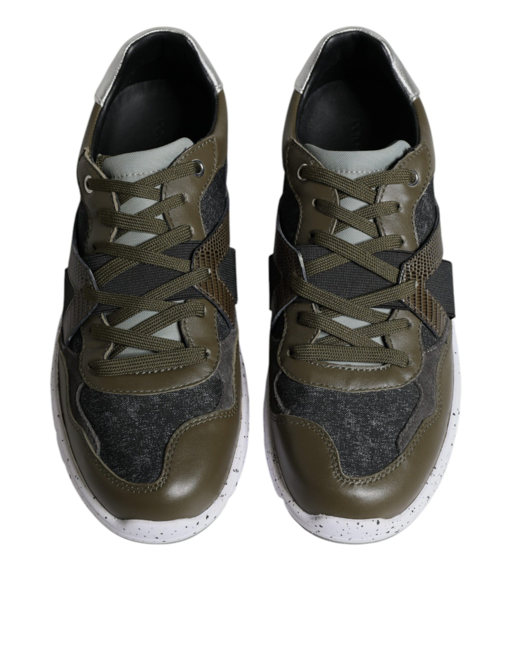 Pair of brown and white sneakers with laces, featuring a canvas and leather design