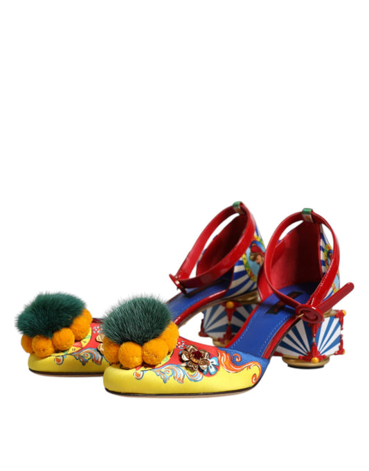 Colorful floral high heel shoes with red straps and furry pom poms on top of each shoe