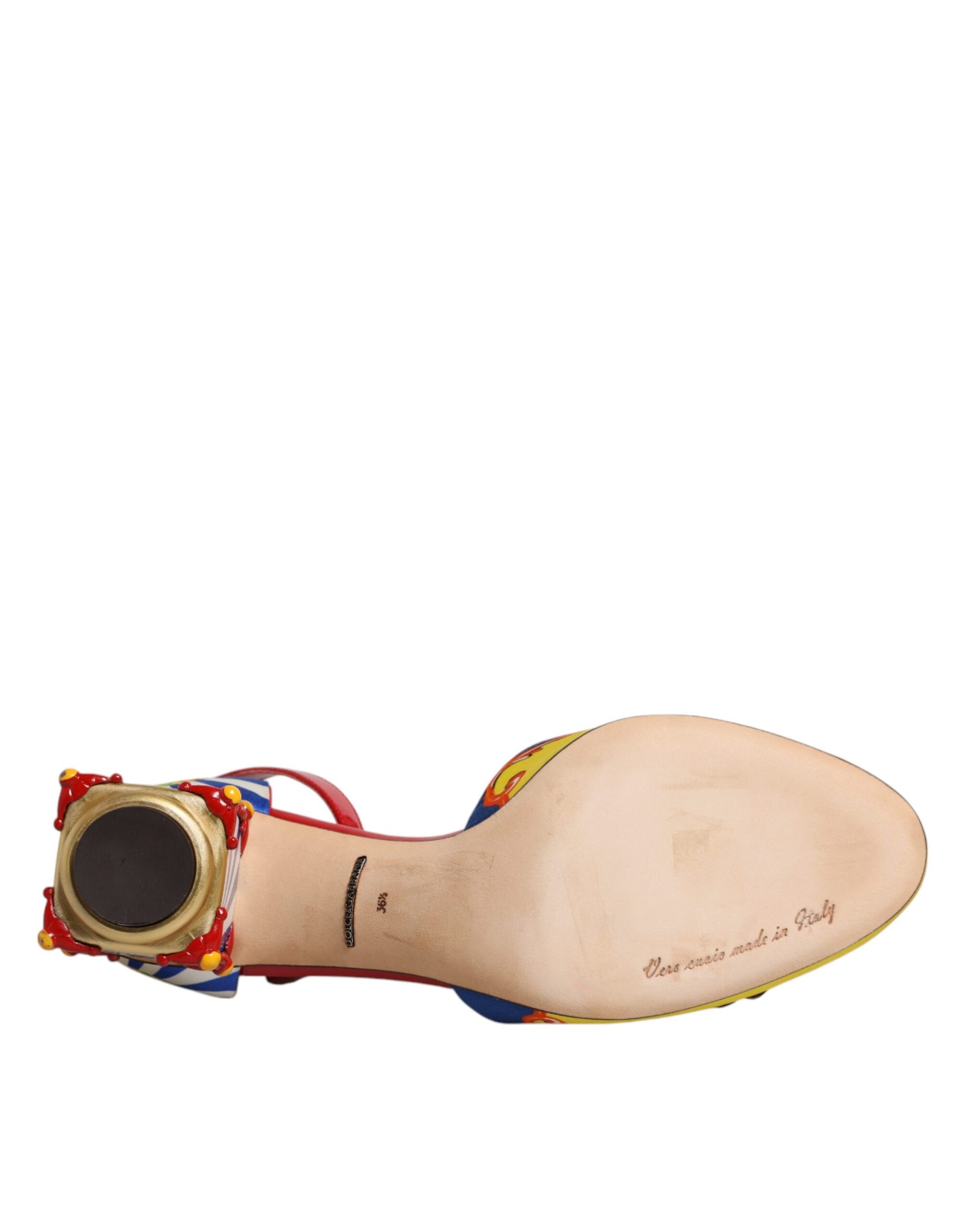 Shoe with red sole and yellow heel