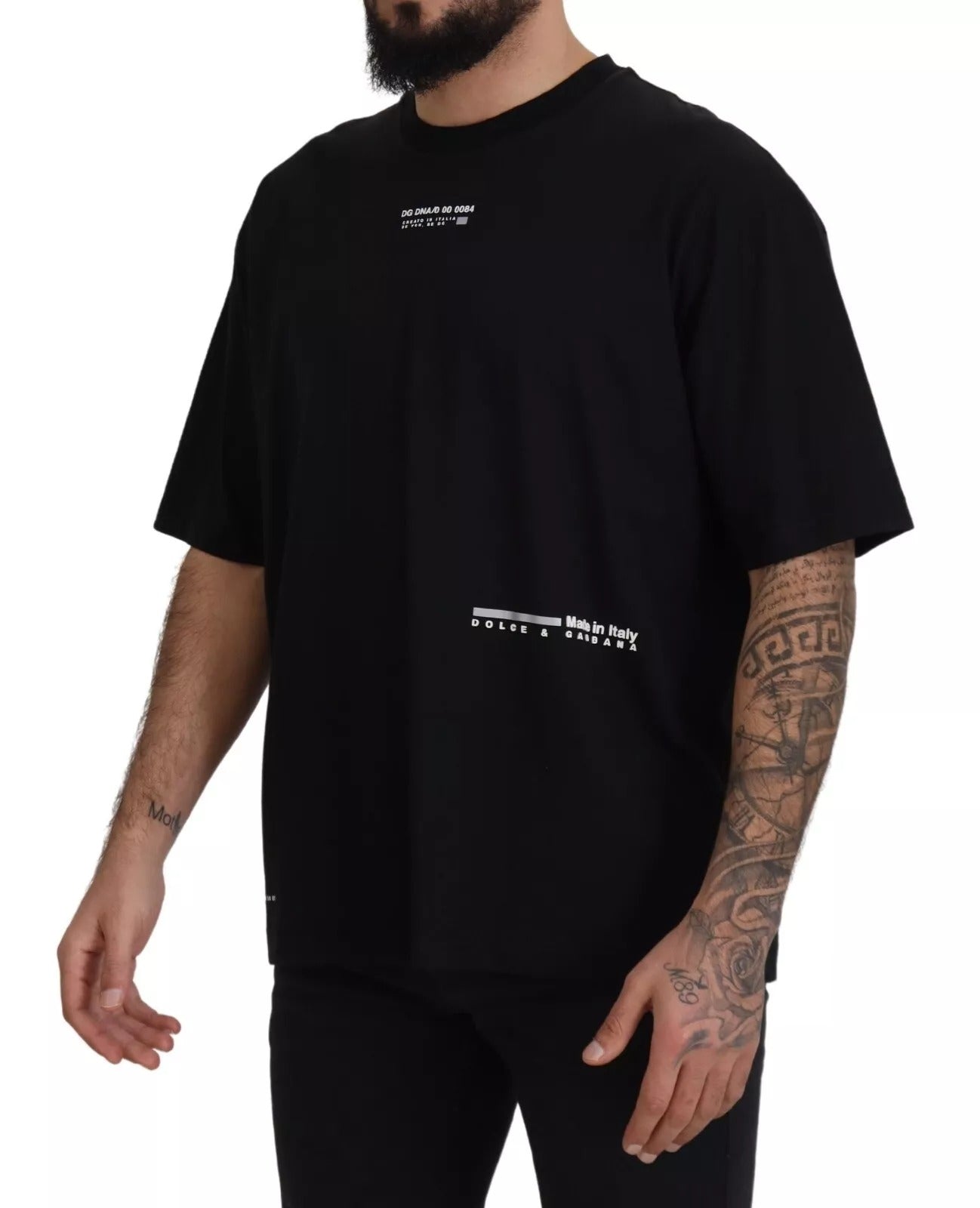 Man wearing black t-shirt with white lettering