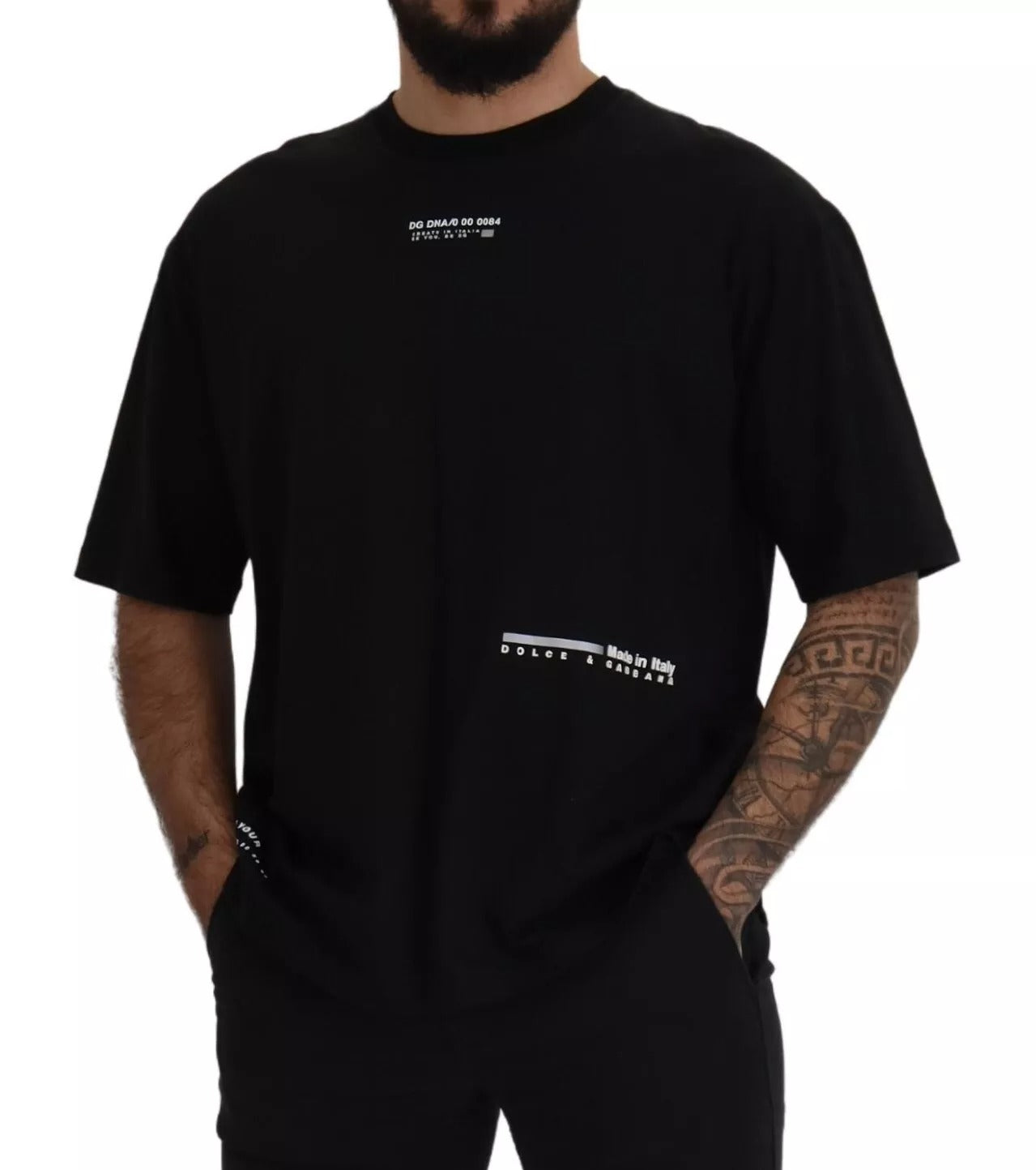 Man wearing black t-shirt with white design on front