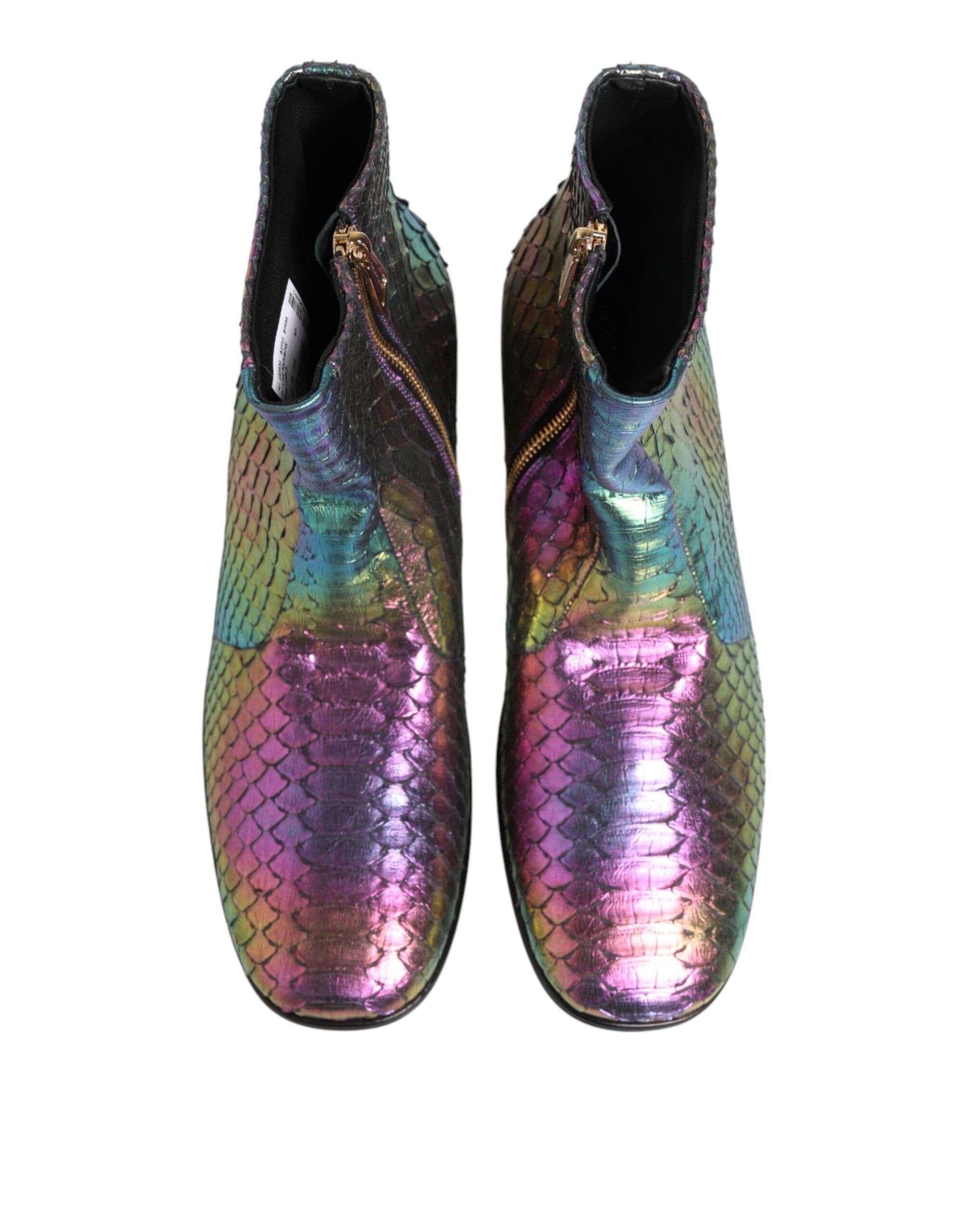 Pair of glittery boots with a snake skin pattern