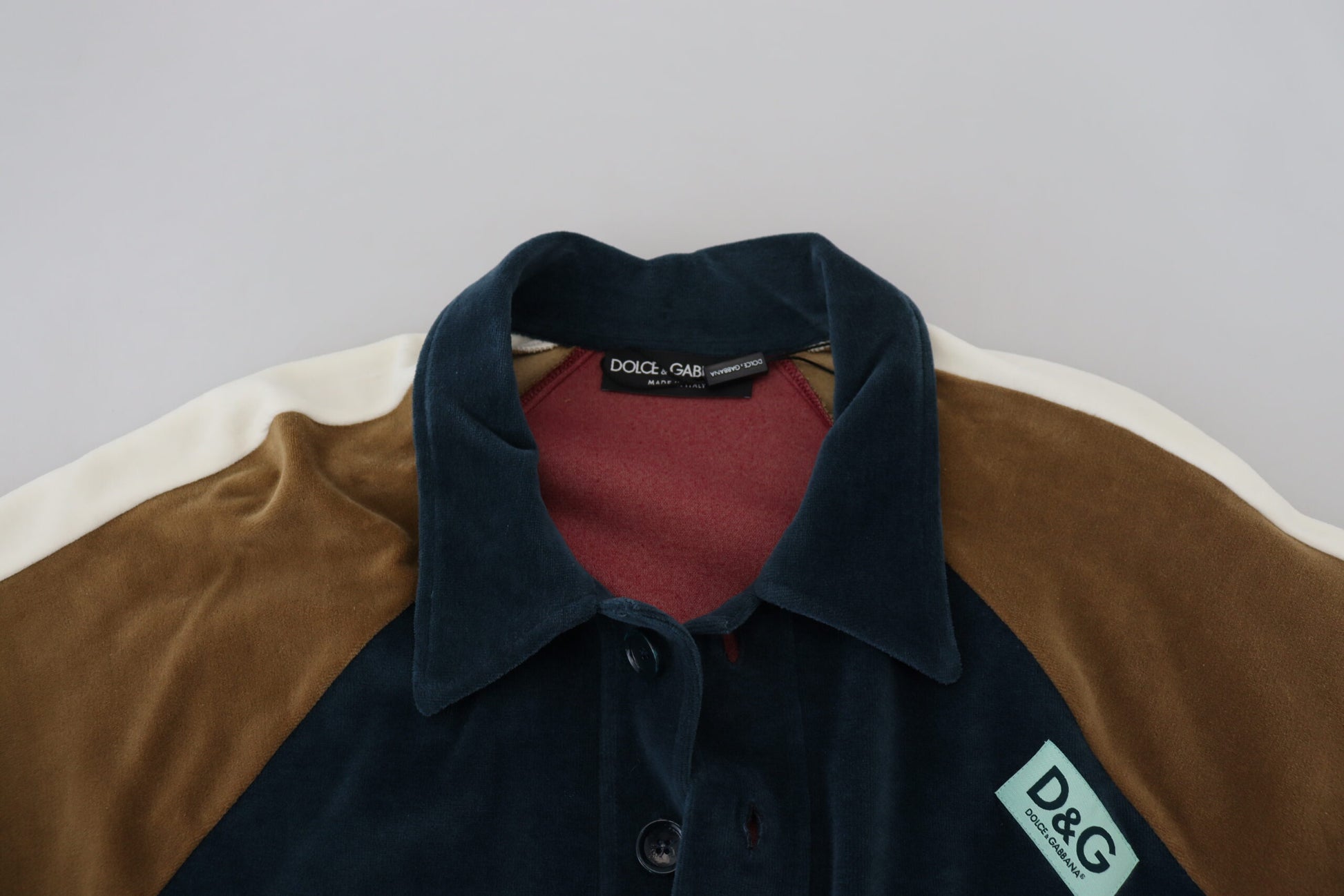 Brown jacket with white collar and cuffs