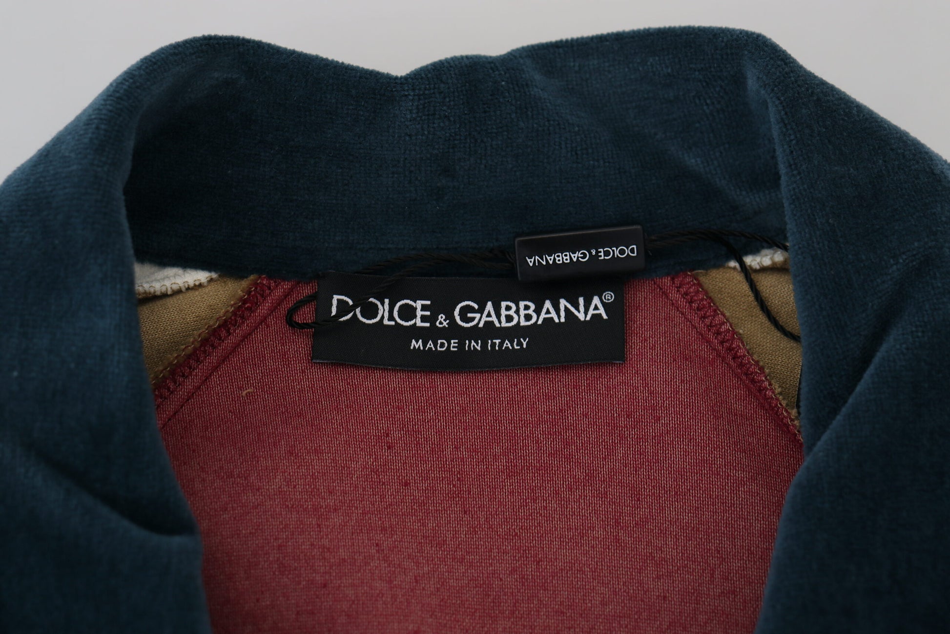 Dark green jacket with tag inside collar