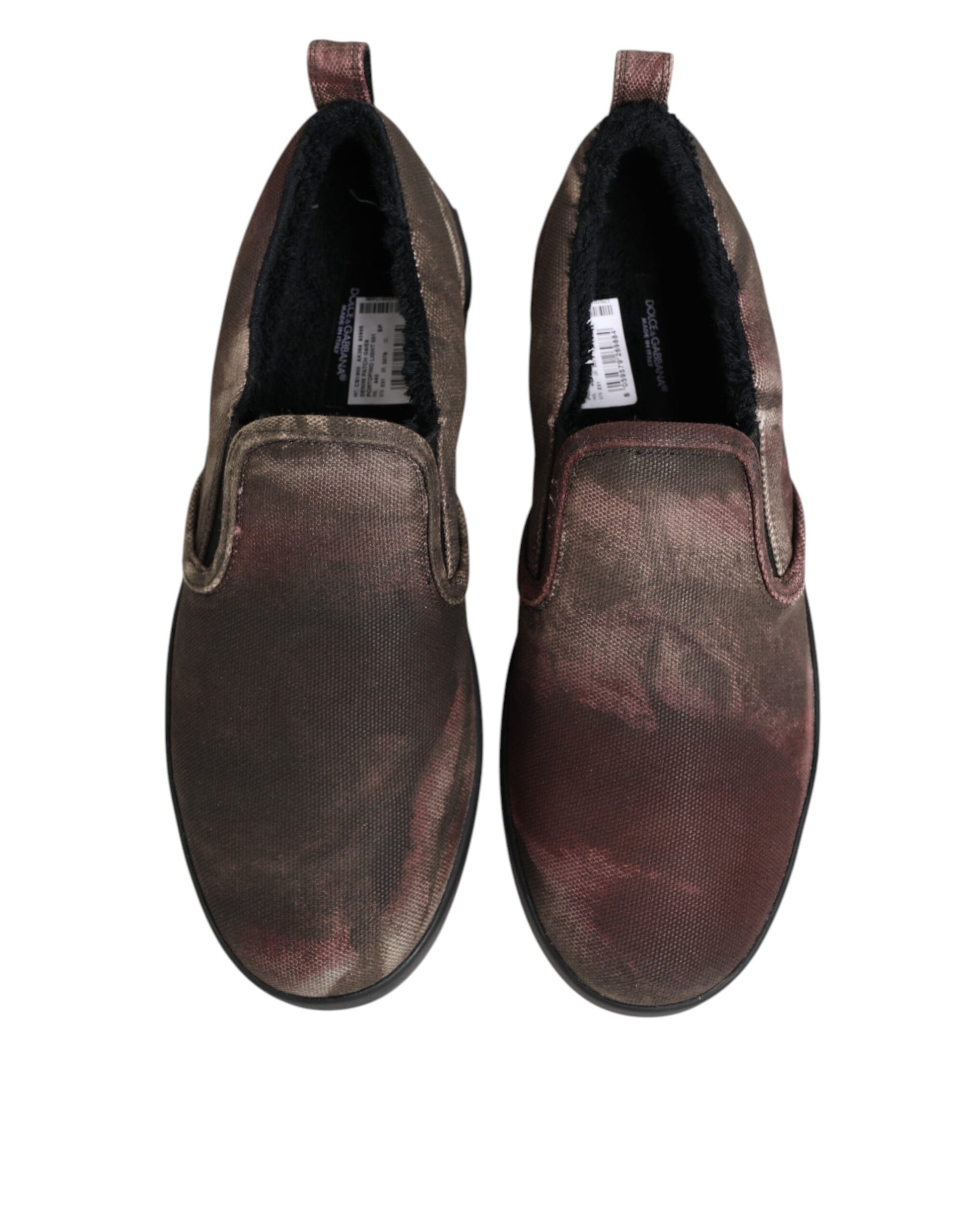 Pair of brown shoes with black soles