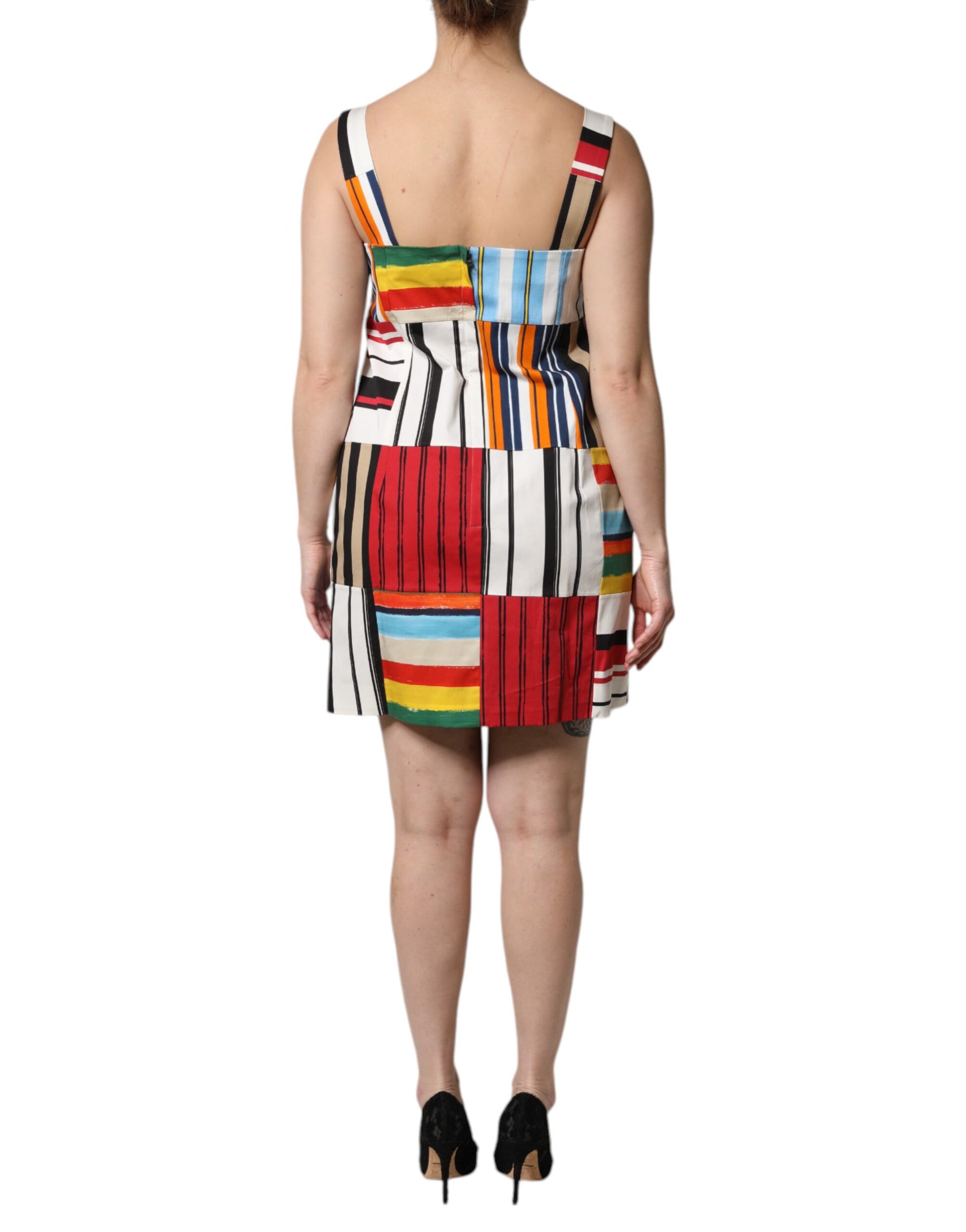 A sleeveless dress with a multicolored stripe pattern