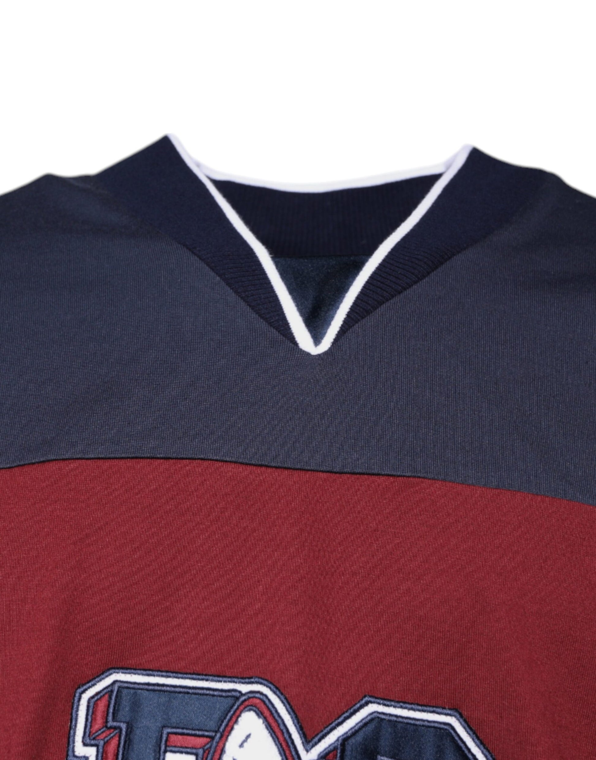 Black and red hockey jersey with white lettering