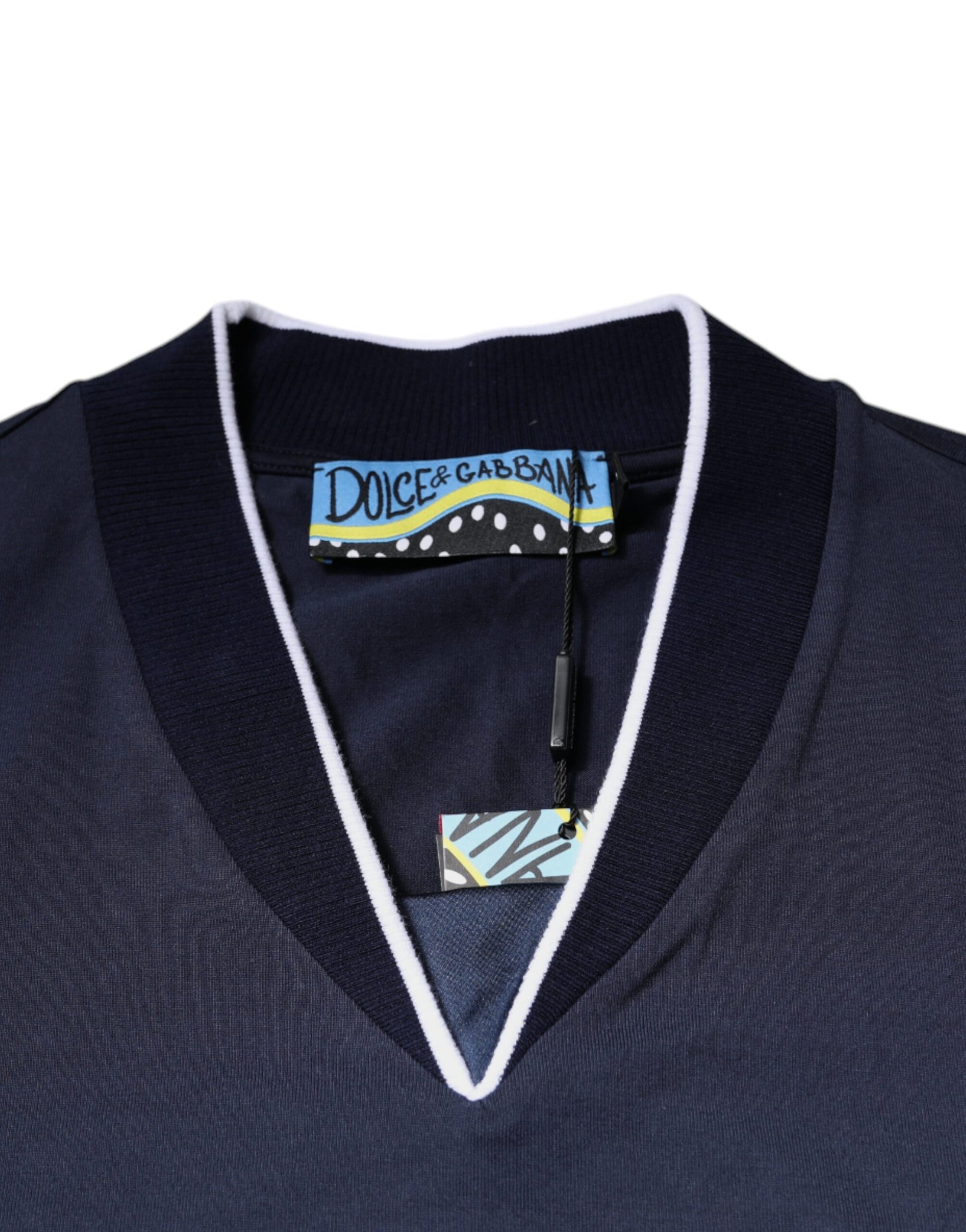 Blue sweater with white collar and cuffs