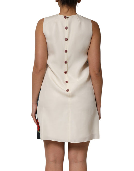 A backless, knee-length dress with a V-neckline and red crystal embellishments