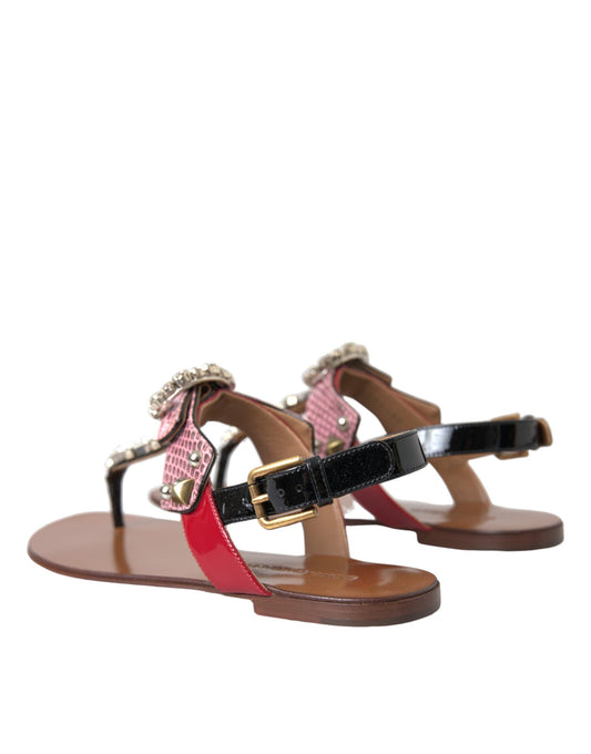 Pair of women's sandals with red straps and black heels