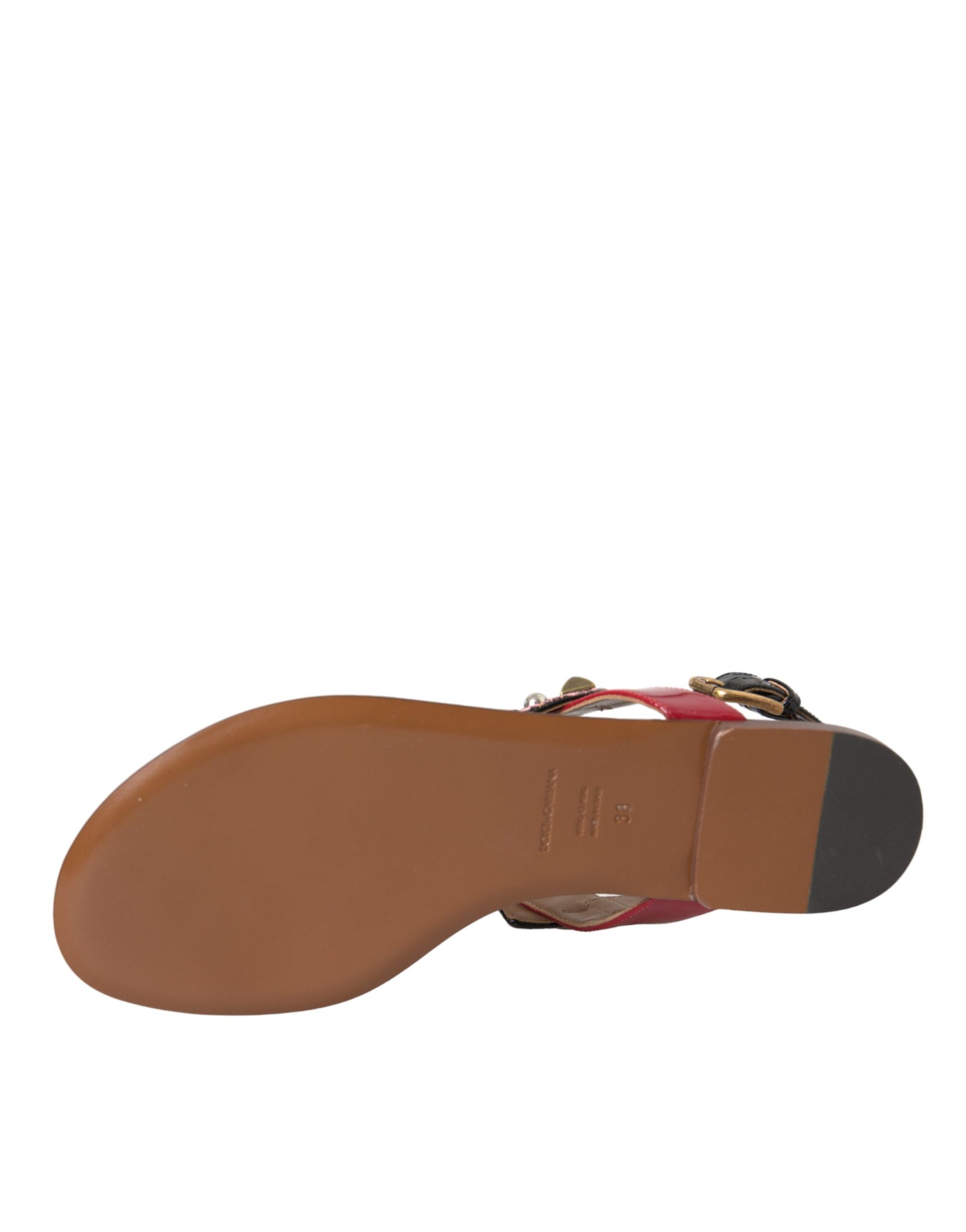 Brown leather shoe with red strap
