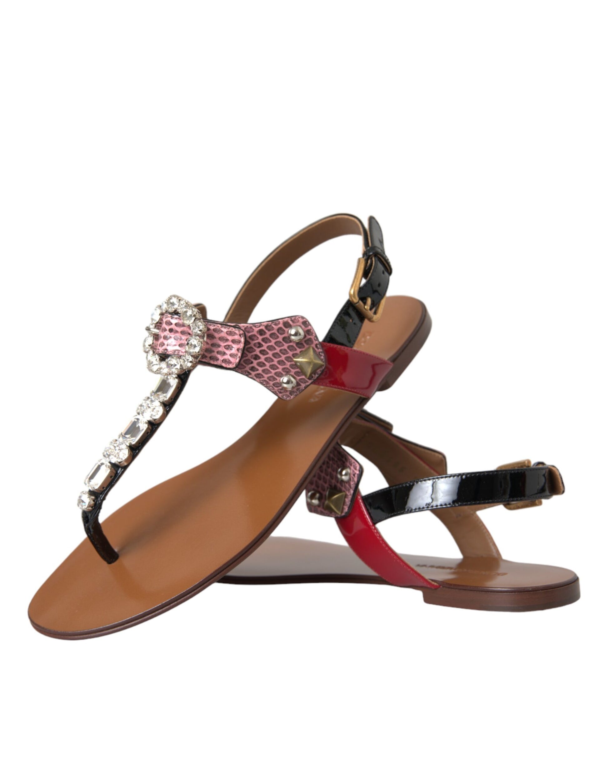 Brown sandal with red straps and embellishments