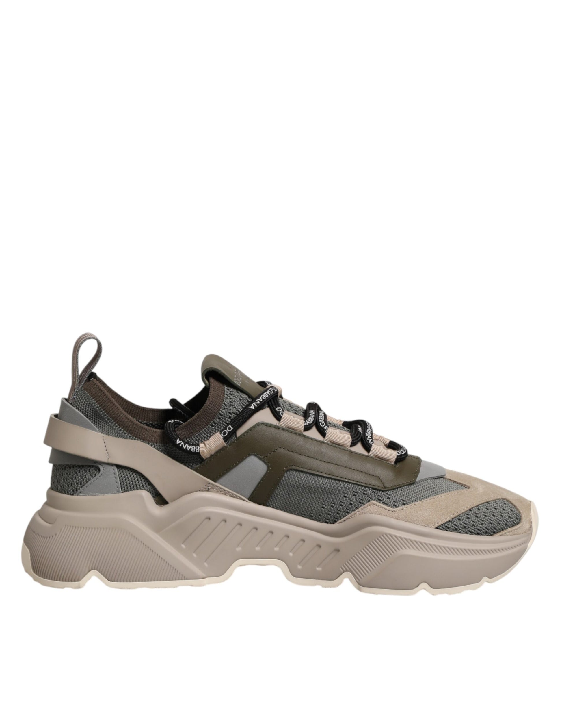 Athletic shoe with laces, camouflage pattern, and chunky sole